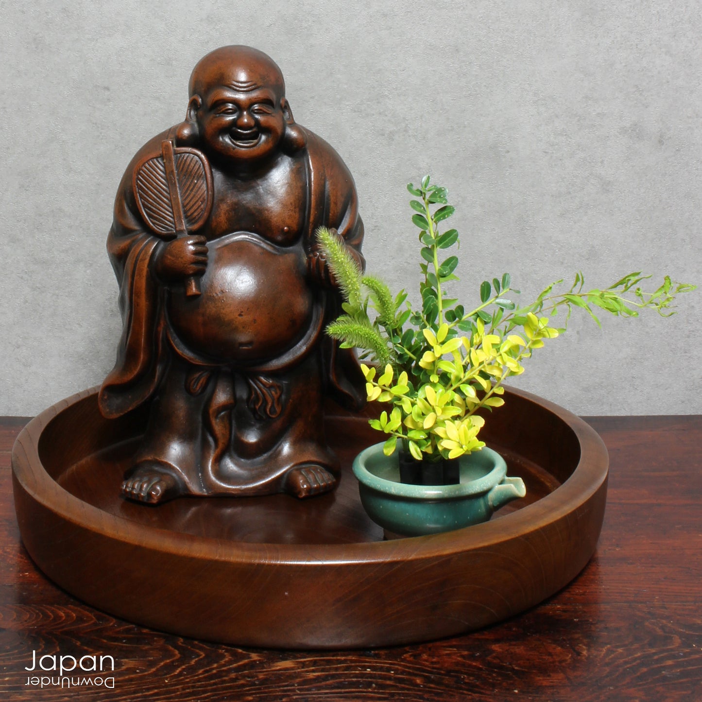 Step into the elegance of Japanese craftsmanship with this remarkable Meiji-era Bizen Hotei god sculpture. This rare treasure, with its understated yet powerful presence, invites the spirit of ancient Japanese artistry into your space. Whether you're an avid art collector, a lover of history, or simply someone who treasures the beauty of authentic craftsmanship, this piece offers a perfect blend of art, culture, and symbolism.