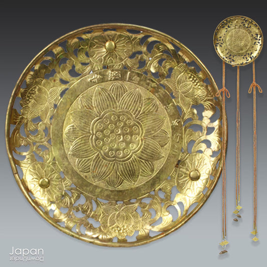 Infuse your home with beauty, spirituality, and history with this Japanese antique Buddhist brass flower plate. Traditionally used in Buddhist ceremonies, this stunning piece represents purification and protection. Whether displayed in your home or meditation space, this unique and meaningful item adds a touch of sacred elegance to any setting.