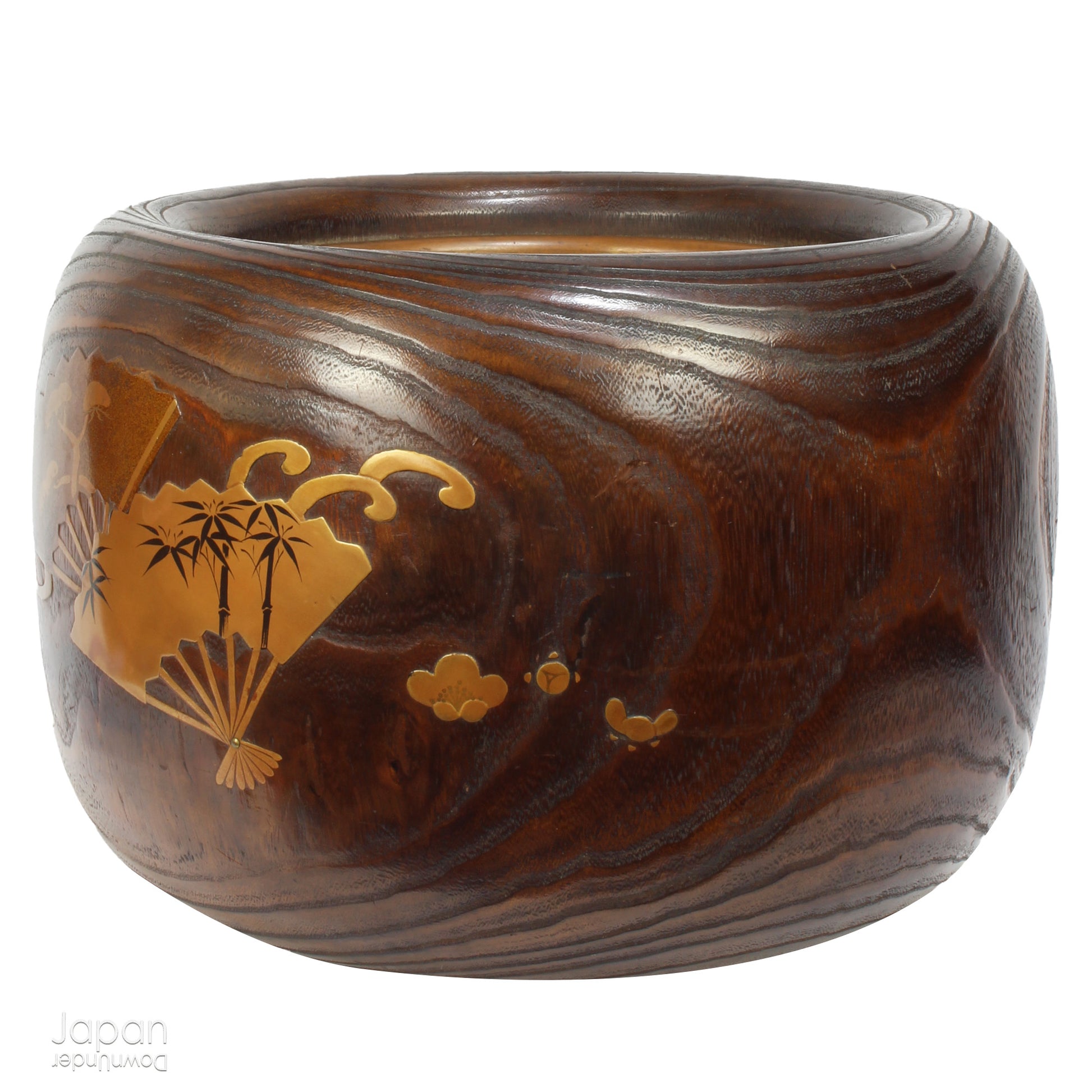 Infuse your home with the charm of Japanese tradition with this stunning antique hibachi heating pot. Adorned with intricate gold makie lacquer fans, this lovely piece seamlessly blends artistry and functionality, making it perfect as a decorative object, vase, or planter. A rare and beautiful find for those who appreciate vintage decor with a touch of elegance and history.