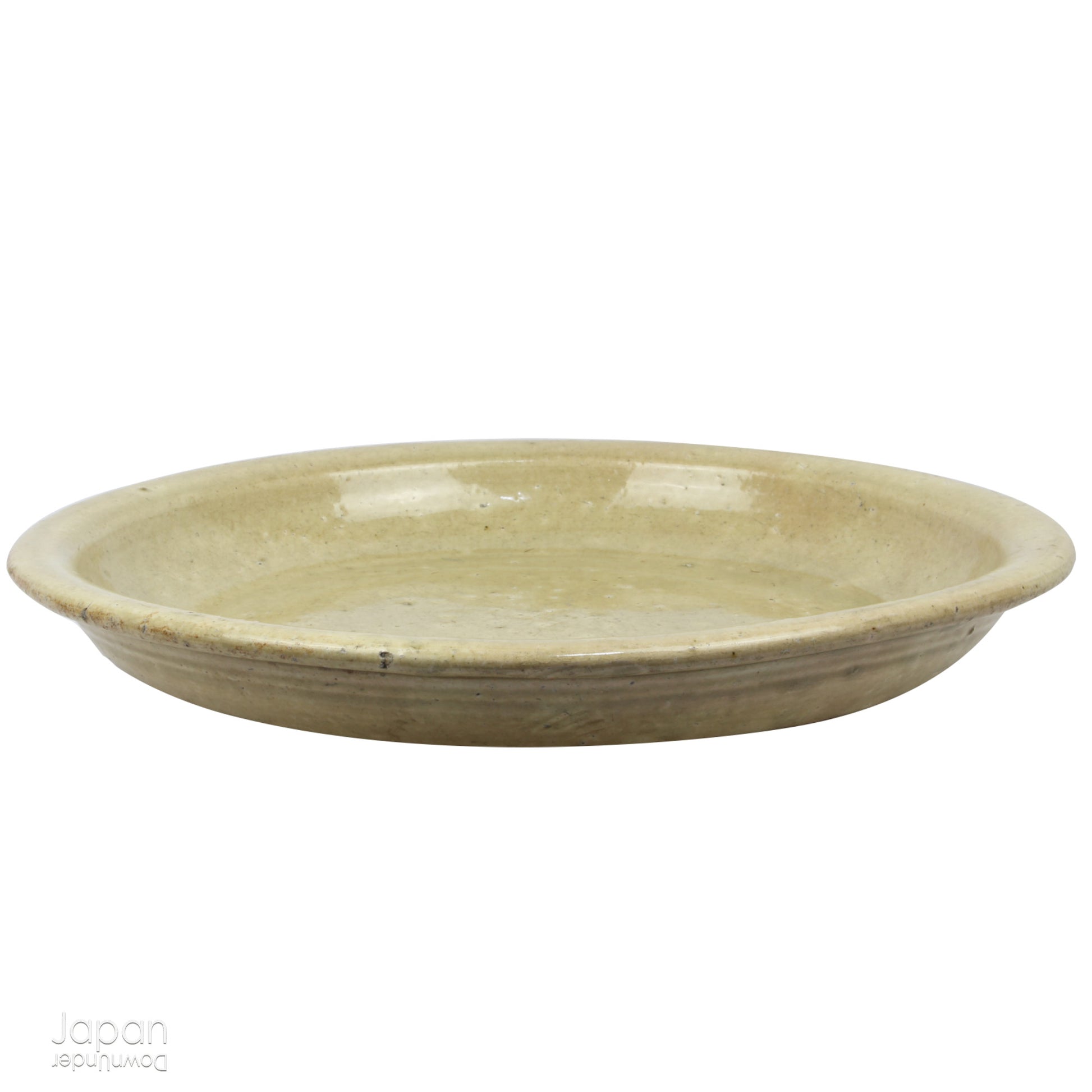 Step into a world of history and artistry with this stunning antique folk art large stoneware serving plate. A true vintage treasure, this piece offers a rare glimpse into the artistry of the Edo and Meiji eras, capturing the essence of a bygone time.