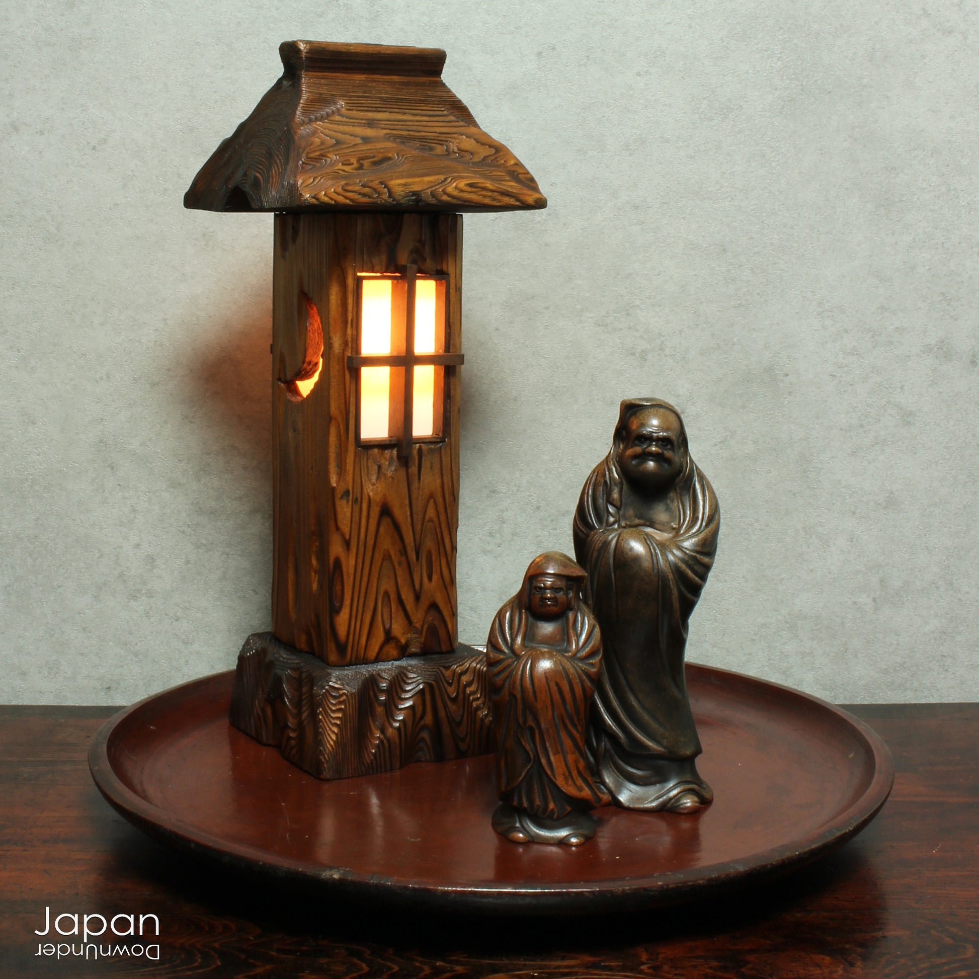Bring warmth and tranquility to your home with this stunning vintage Japanese table lamp, crafted from Akita cedar wood. Inspired by the serene beauty of traditional Japanese garden lanterns, this unique piece casts a soft, ambient glow, perfect for creating a peaceful atmosphere in any room and adding a touch of Zen to your home.