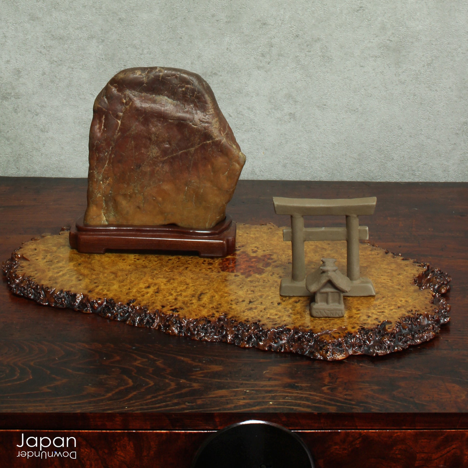 Bring timeless elegance and natural beauty into your space with this exquisite stand, handcrafted from rare burled Chinese quince wood. Designed to showcase bonsai, suiseki viewing stones, treasured ornaments, or seasonal flower arrangements, this piece adds a refined touch to any setting.