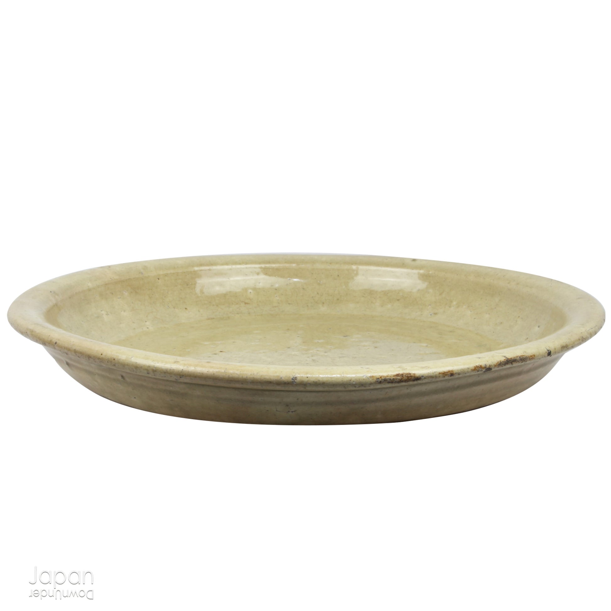 Step into a world of history and artistry with this stunning antique folk art large stoneware serving plate. A true vintage treasure, this piece offers a rare glimpse into the artistry of the Edo and Meiji eras, capturing the essence of a bygone time.