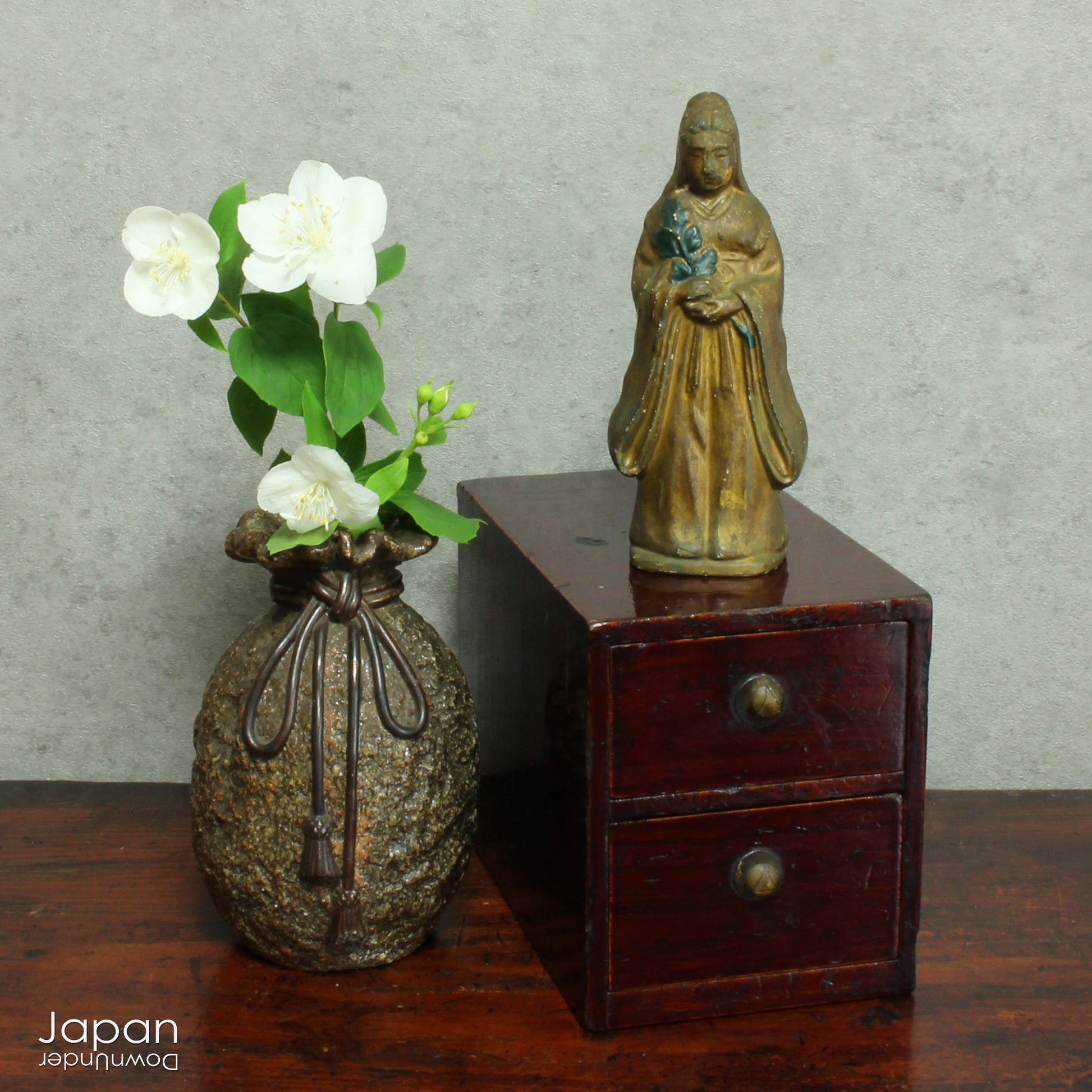 Discover the quiet charm of this petite Taisho era Japanese lacquered wood box - a piece that blends humble functionality with an understated elegance. Designed for storing your most cherished small items, it brings a subtle touch of folk artistry to any setting while offering a truly storied way to organize and display.