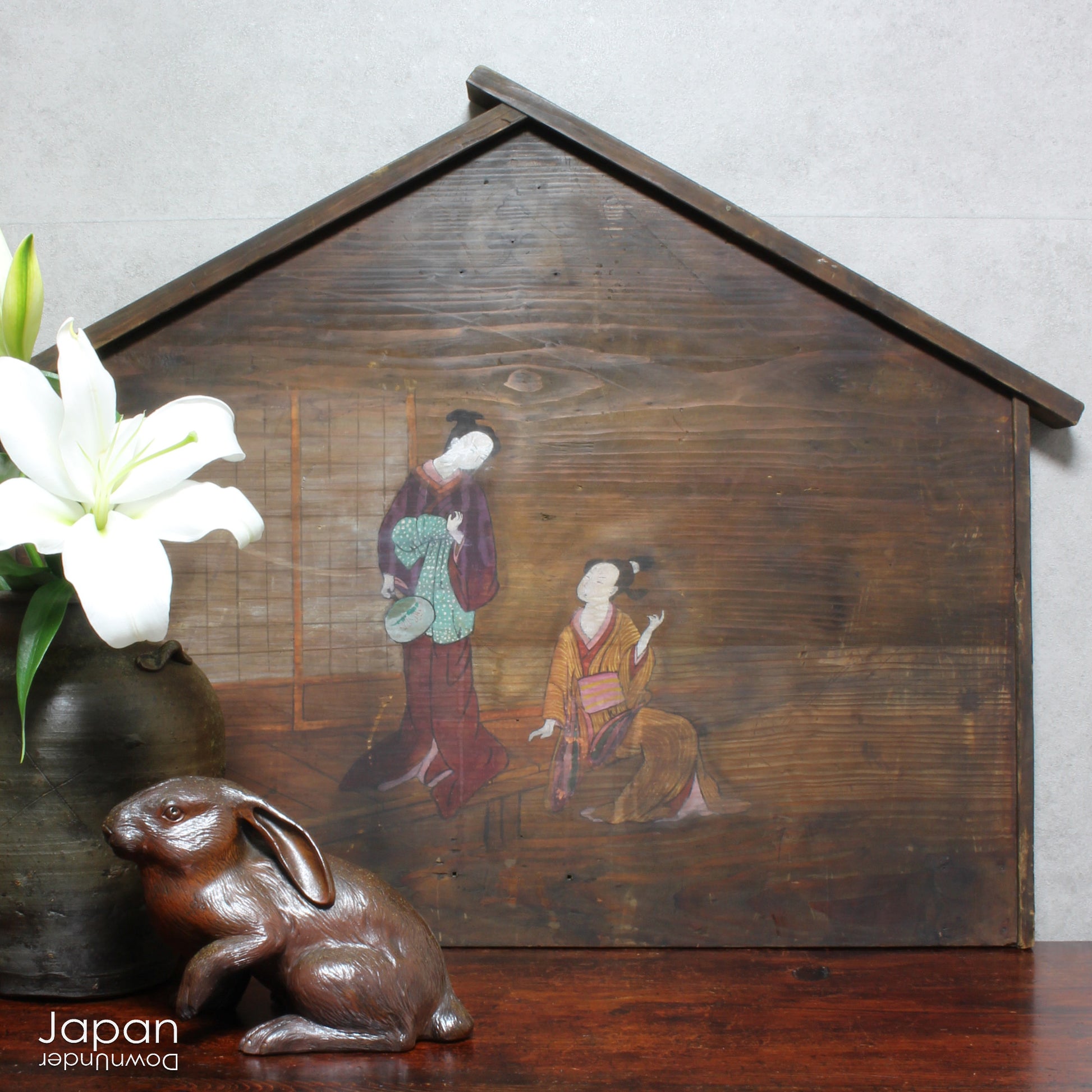 Step back in time with this stunning 1800‘s folk art painting featuring elegant Japanese women in kimono on an extremely large Japanese ema. Originally a donation to a shrine, this unique piece captures the beauty and tradition of Japanese culture.