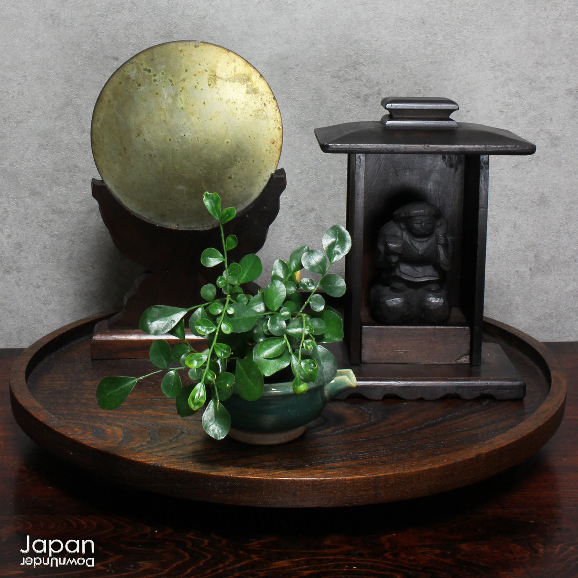 A perfect addition to your spiritual space, this quaint rustic antique Shinto shrine, made to be placed on the kamidana (god shelf), houses the lucky god Daikoku. The charming hand crafted god house embodies the essence of Shinto folk faith, creating an atmosphere of serenity in your home. A meaningful decor piece, that not only celebrates traditional Japanese beliefs but also invites blessings into your home.