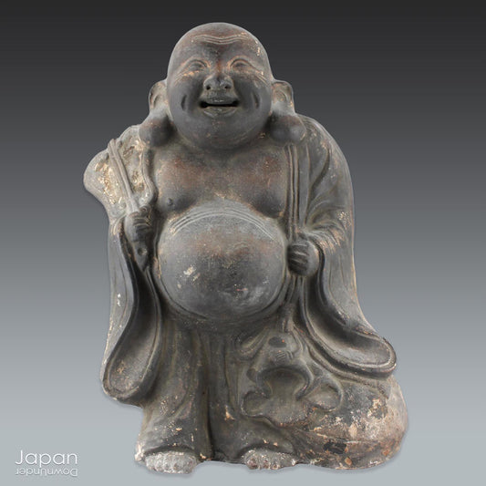 A wonderful piece of history, this charming 1800’s clay doll, shaped as Hotei, is the god of contentment and happiness and the guardian of children. This unique Shinto amulet is a rare find, adding a touch of whimsy and protection to your home.