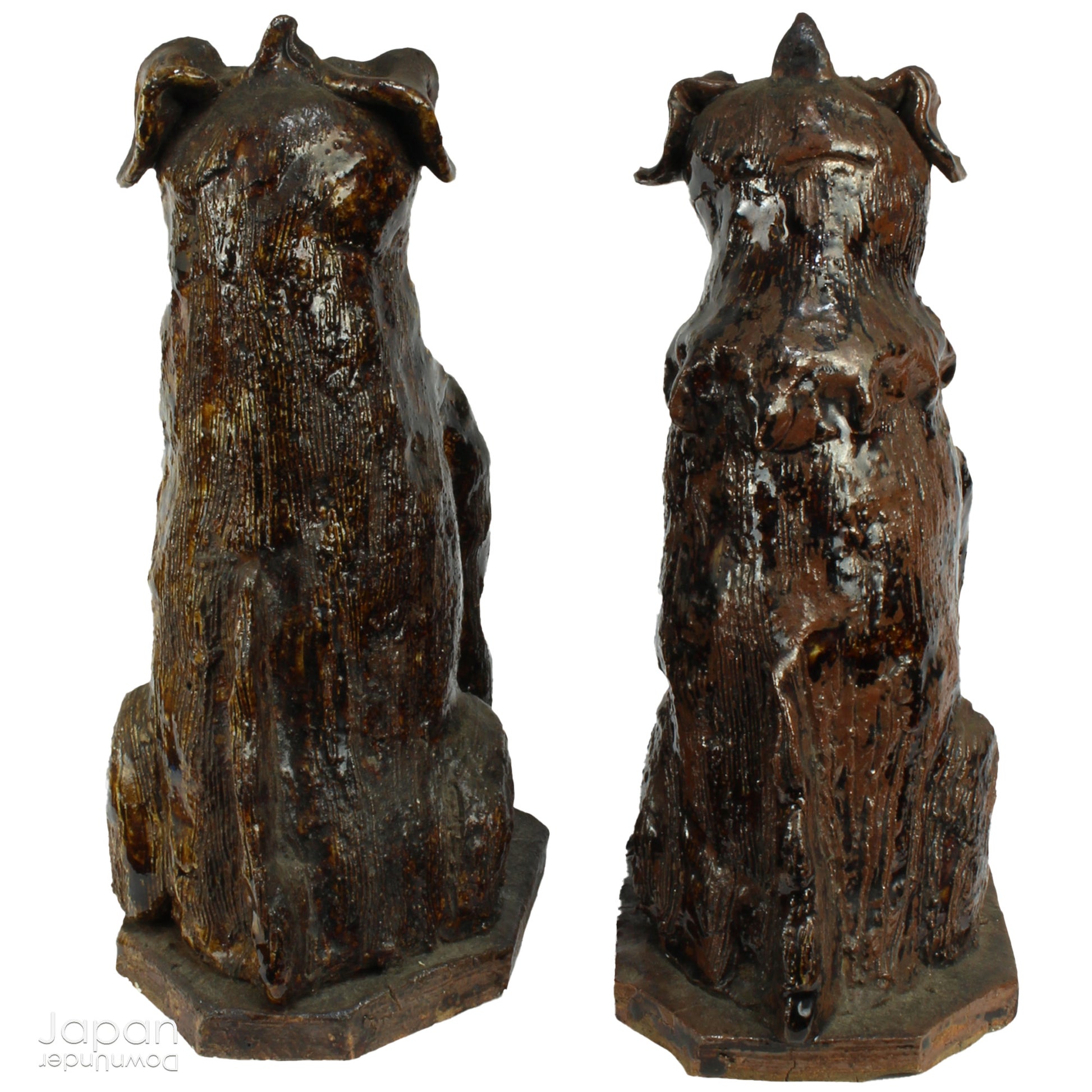 An enchanting duo of antique stoneware lion dogs, known as komainu. Believed to ward off evil, these guardians stand watch at the entrance of Shinto shrines, and will add a touch of mystique to your decor. Handcrafted with intricate details, the lion dogs are sure to bring a sense of protection and tradition to your space.