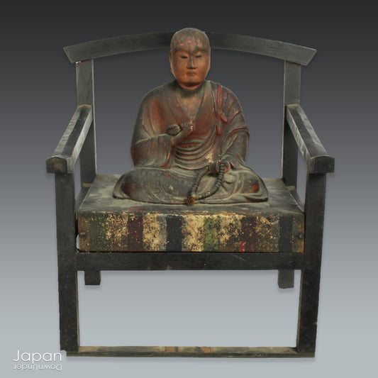 A wonderful piece of history, this large 1800’s wooden Buddhist statue captures Kukai seated in lotus pose, deep in meditation. The statue exudes tranquility and peace, perfect for meditation and mindfulness practices.