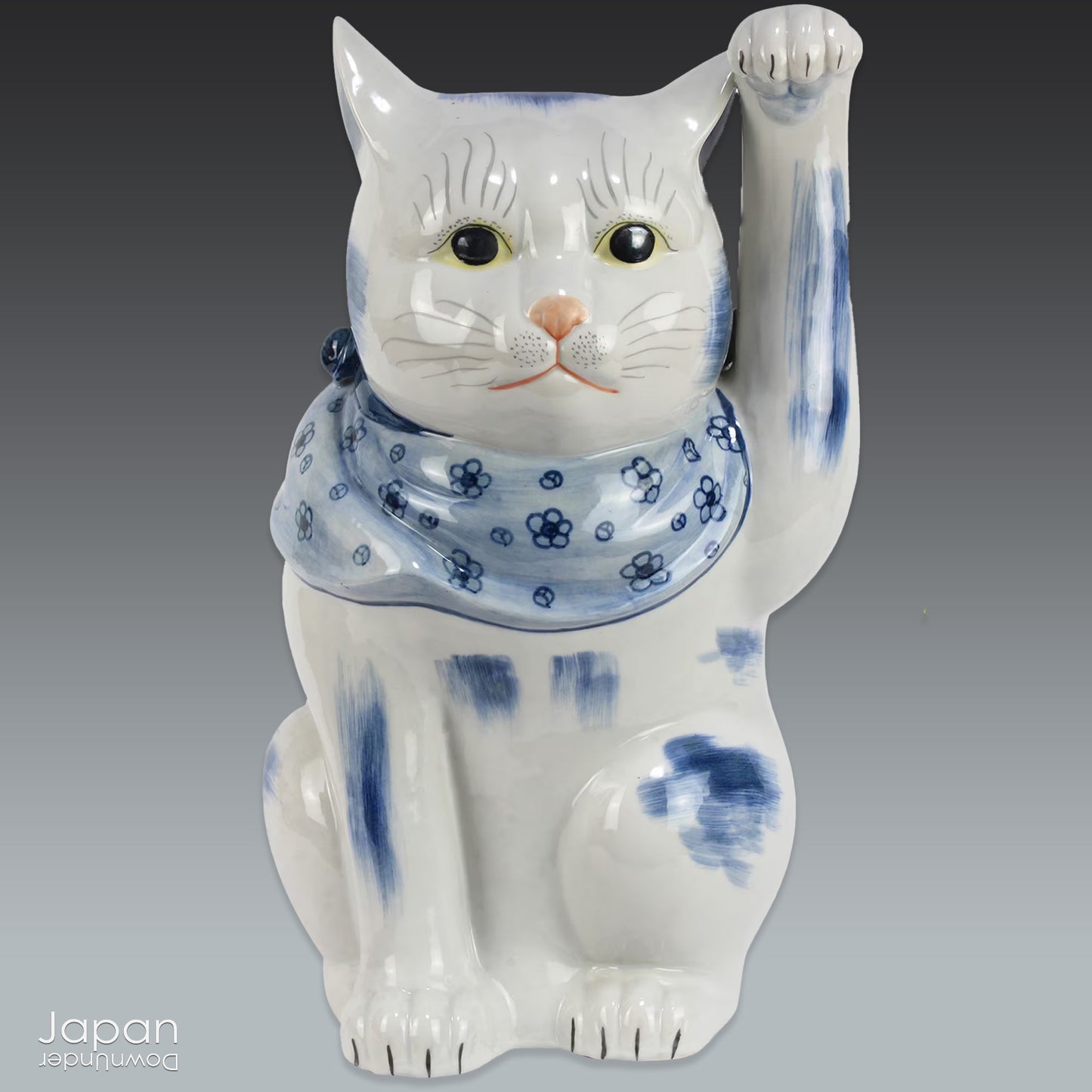 Bring an aura of good fortune and opulence into your space with this stunning large and heavy black Kutani pottery maneki neko cat. This beautiful piece beckons in good luck and wealth, exuding a sense of simple elegance that is truly striking. A must-have for those seeking to add a touch of charm and prosperity to their decor.