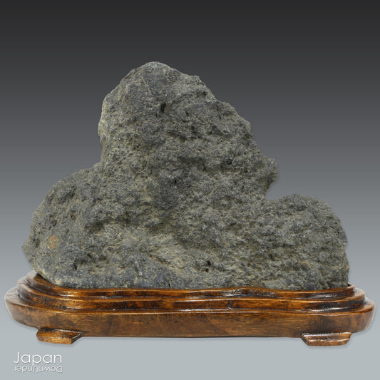 Transform your interior with the quiet presence and timeless allure of this vintage Japanese suiseki - an artful stone shaped by nature and steeped in tradition. Perched on a finely hand-carved wooden daiza (base), it radiates harmony, balance, and contemplative elegance - an ideal focal point for a serene, introspective space.