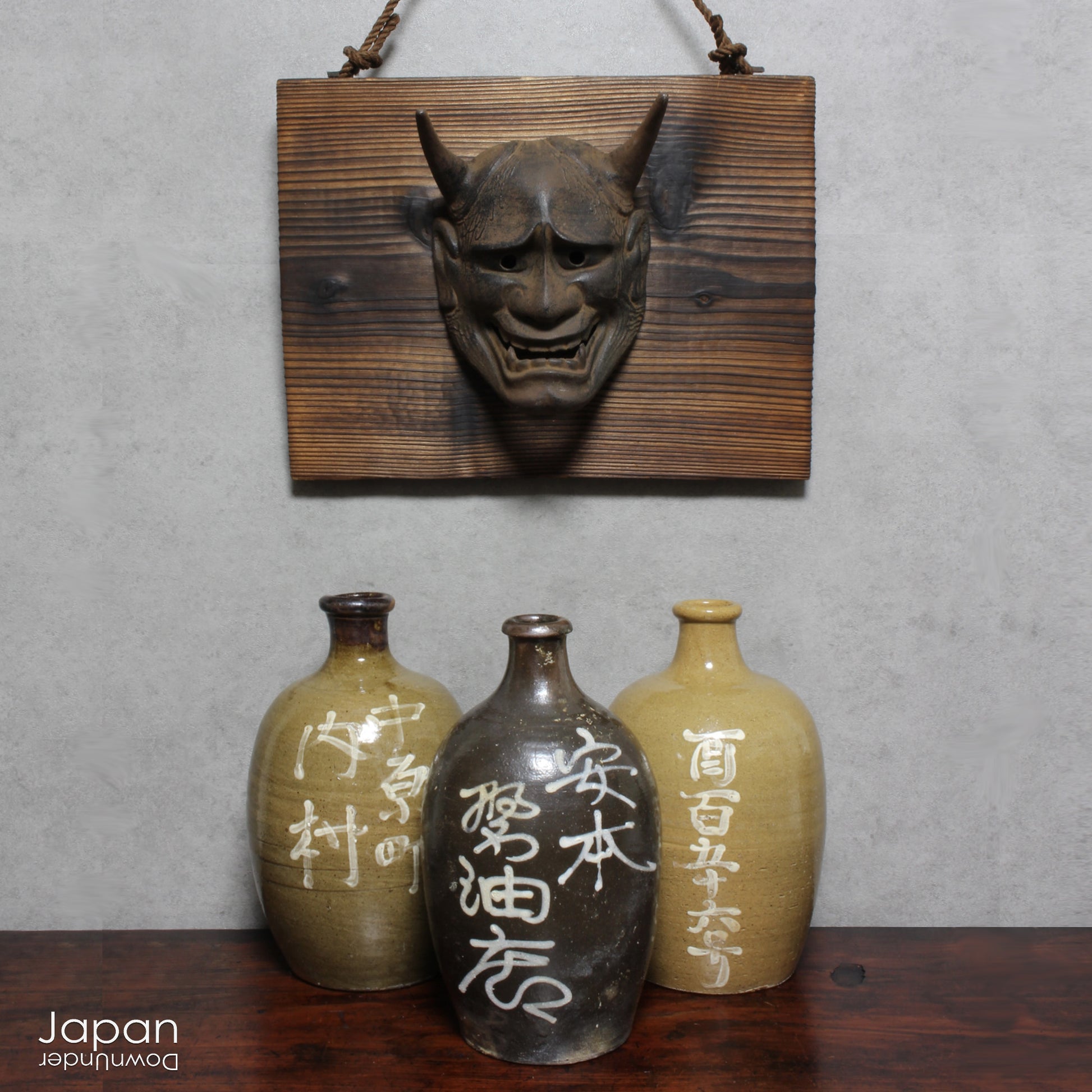 Uncover the charm and eco-conscious history of this 1900s vintage stoneware sake bottle, a one-of-a-kind treasure once used for both the purchase and storage of sake. Perfect for sake enthusiasts, collectors, or anyone looking to add a unique and sustainable piece to their collection, this bottle is a rare find that won’t last long!