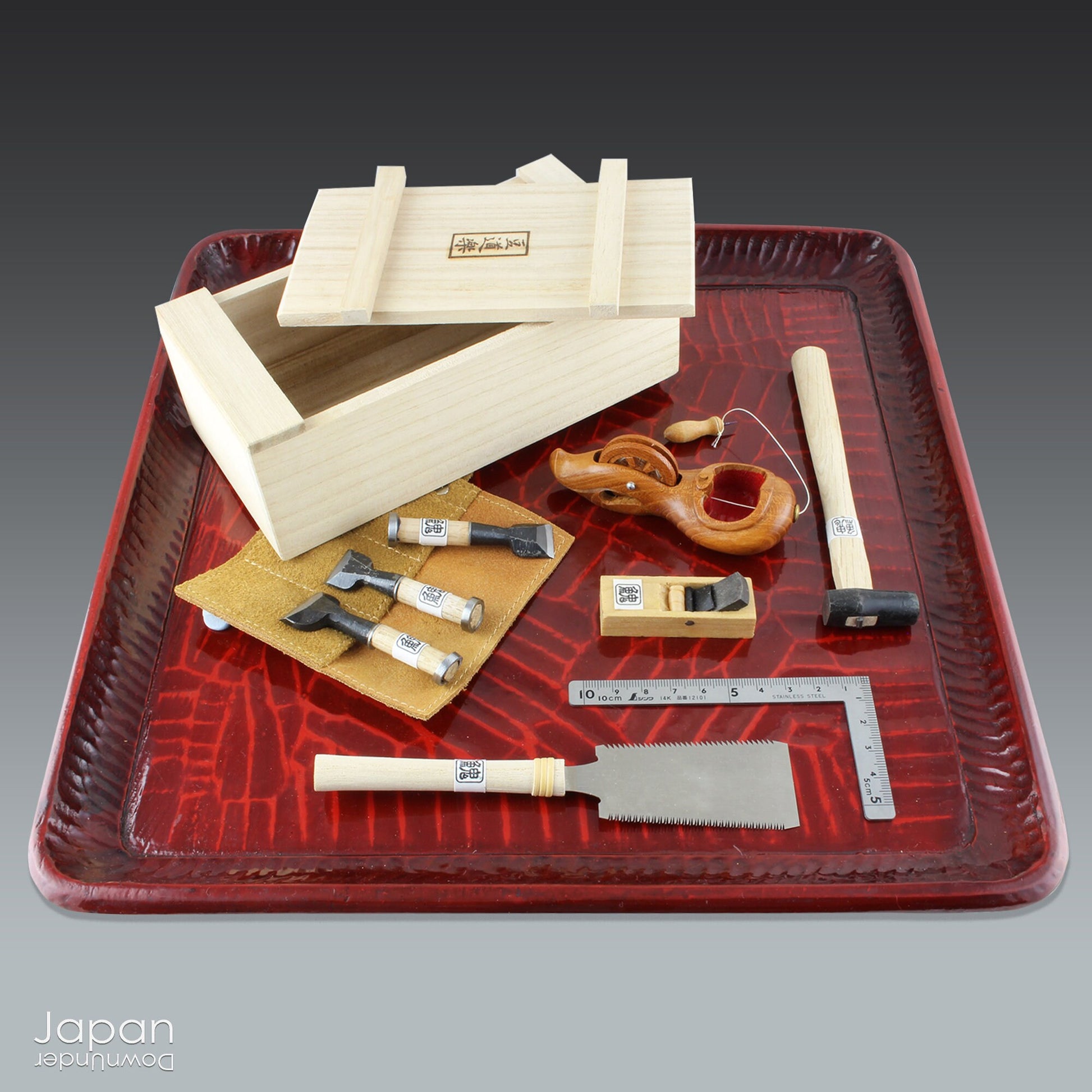 This exquisite little miniature Japanese carpenter tool set is totally made to scale and can even be used for small projects. It comes neatly packed wrapped in a tool bag and placed in an authentic carpenter’s tool box.
