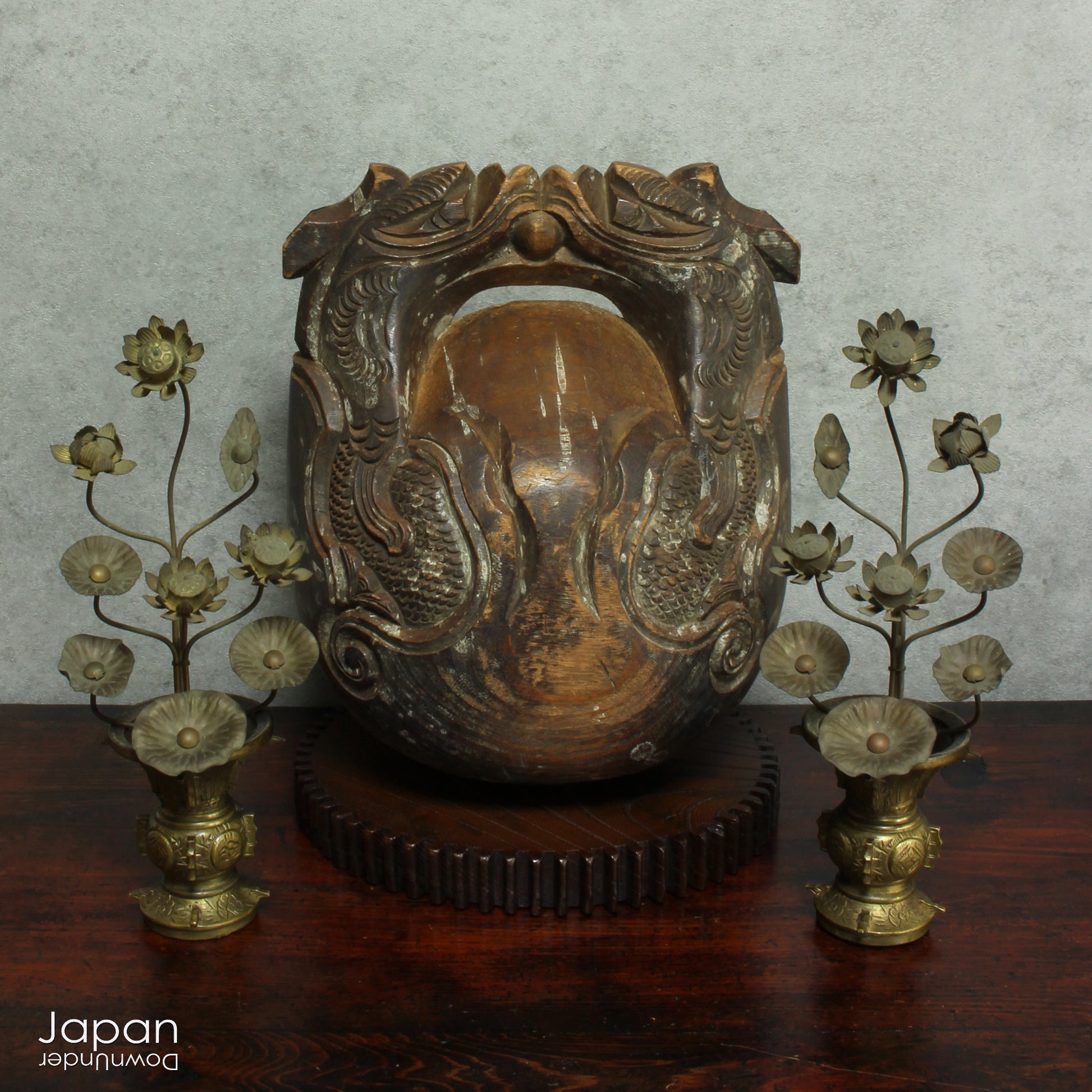 Step into a world of timeless beauty with this wonderful antique mokugyo or chanting drum. With the beautiful patina of age and subtle layers of candle wax drippings, this unique prayer and meditation tool makes a stunning  art object adding a touch of historical elegance to your spiritual space.