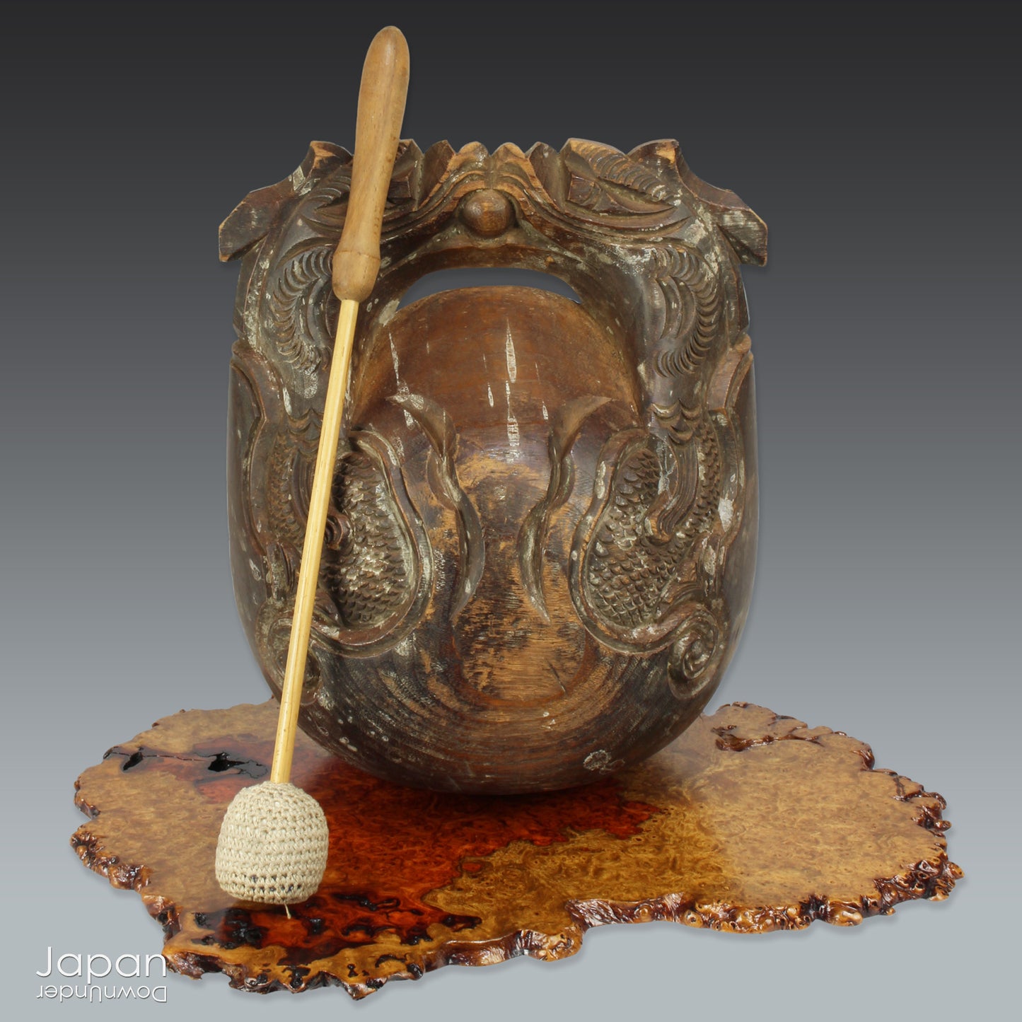 Step into a world of timeless beauty with this wonderful antique mokugyo or chanting drum. With the beautiful patina of age and subtle layers of candle wax drippings, this unique prayer and meditation tool makes a stunning  art object adding a touch of historical elegance to your spiritual space.