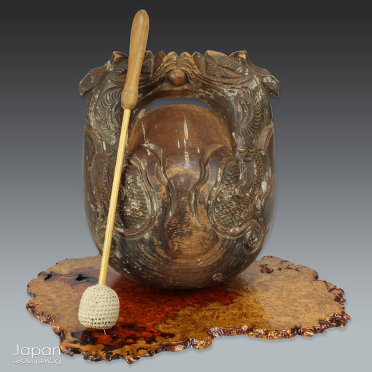 Step into a world of timeless beauty with this wonderful antique mokugyo or chanting drum. With the beautiful patina of age and subtle layers of candle wax drippings, this unique prayer and meditation tool makes a stunning  art object adding a touch of historical elegance to your spiritual space.