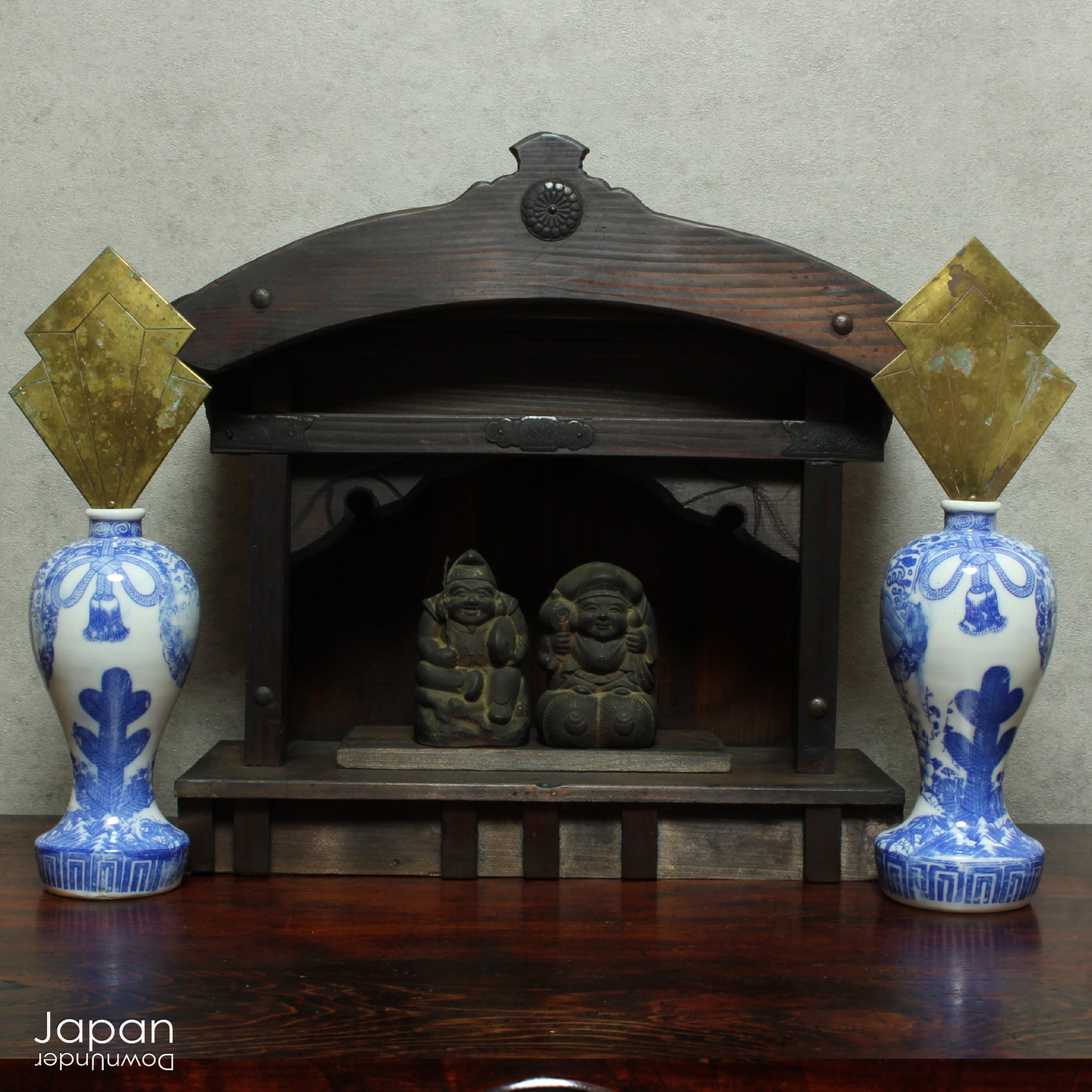 A perfect addition to your spiritual space, this rustic antique Shinto shrine, made to be placed on the kamidana (god shelf), houses the lucky god Ebisu and Daikoku. This charming hand crafted god house embodies the essence of Shinto folk faith.