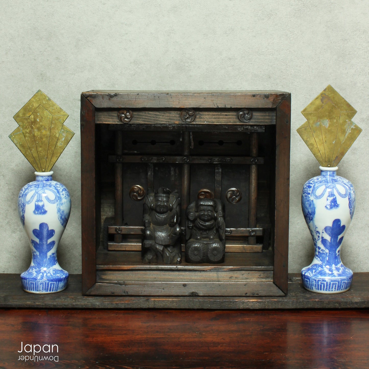 Bring a piece of history into your home with this rare 1800's Shinto folk faith shrine, perfect for creating a sacred space on your own god shelf or within your home. This antique religious decor piece includes the lucky gods, Ebisu and Daikoku.