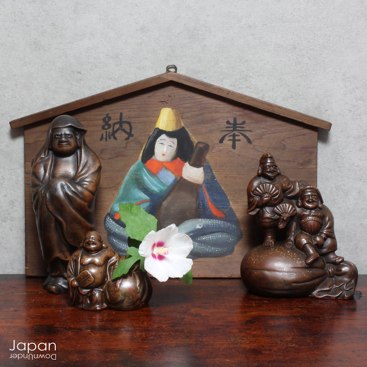 This large ema is painted with Benzaiten, the Goddess of financial fortune, music, and art. She is also believed to bless farmers, merchants and women hoping for success in love. Benzaiten is pictured holding a Biwa, a traditional Japanese lute.