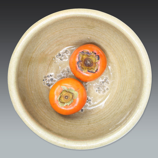 Add a touch of timeless history to your kitchen with this exquisite antique folk art stoneware mixing bowl. A true vintage gem, it offers a captivating glimpse into the artistry of the Edo and Meiji eras.