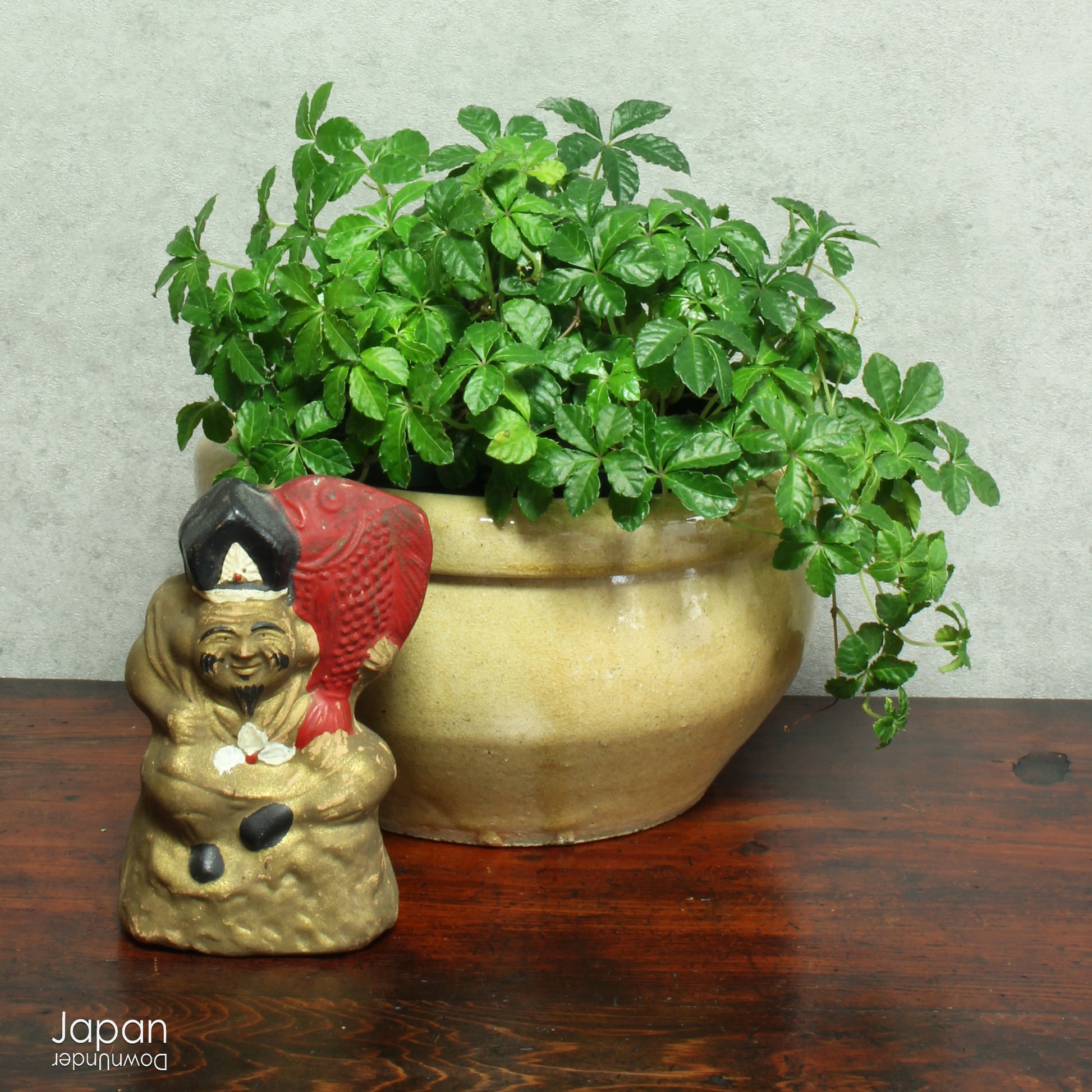 Add a touch of timeless history to your kitchen with this exquisite antique folk art stoneware mixing bowl. A true vintage gem, it offers a captivating glimpse into the artistry of the Edo and Meiji eras.