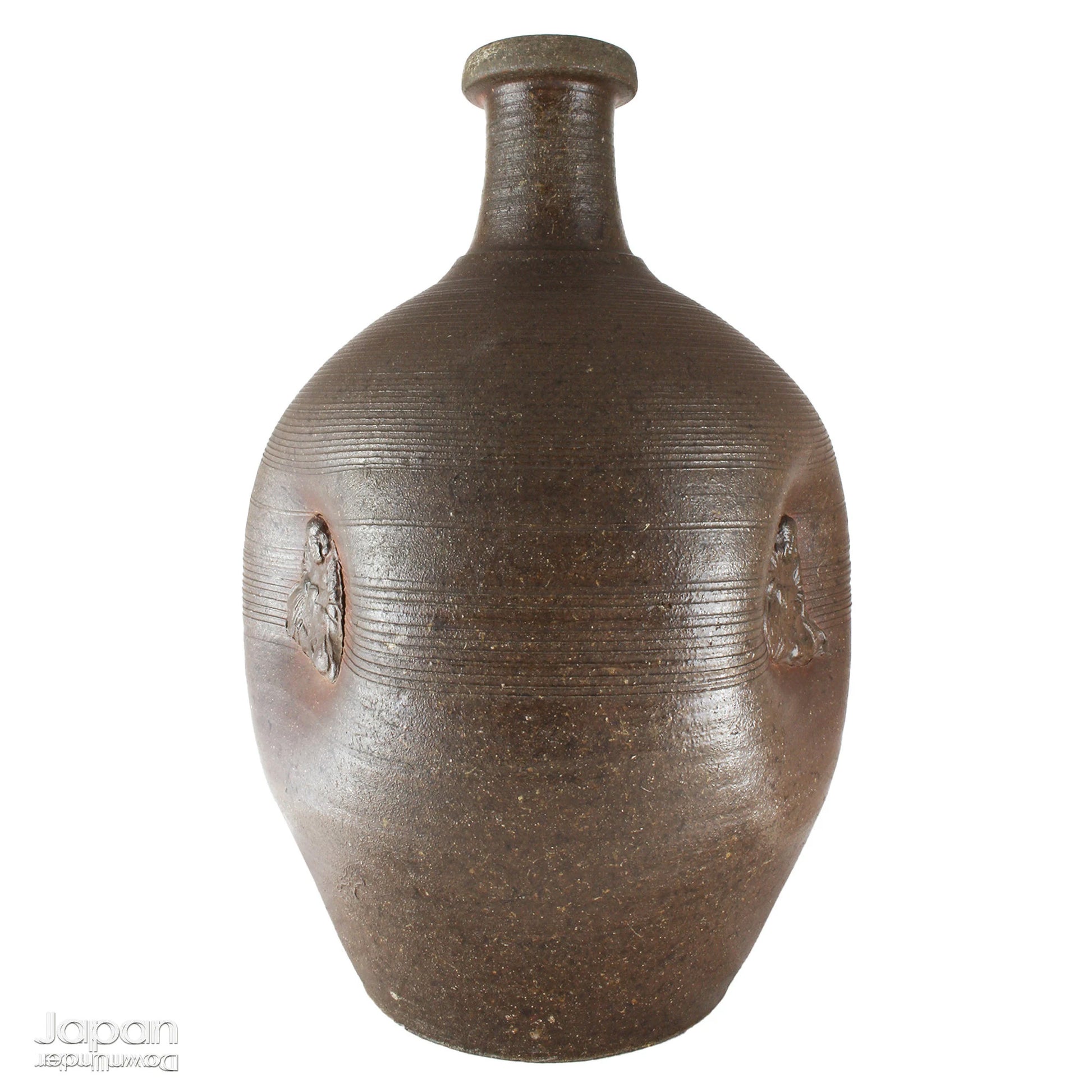 Add depth and story to your interior with this striking Taisho-era Bizen ware sake tokkuri, adorned with Hotei - the cheerful god of happiness, children, and good fortune, and one of Japan’s beloved Seven Lucky Gods. More than just a vessel, this antique bottle is a captivating example of Japanese folk craftsmanship, equally compelling as a sculptural display piece or a uniquely soulful vase.
