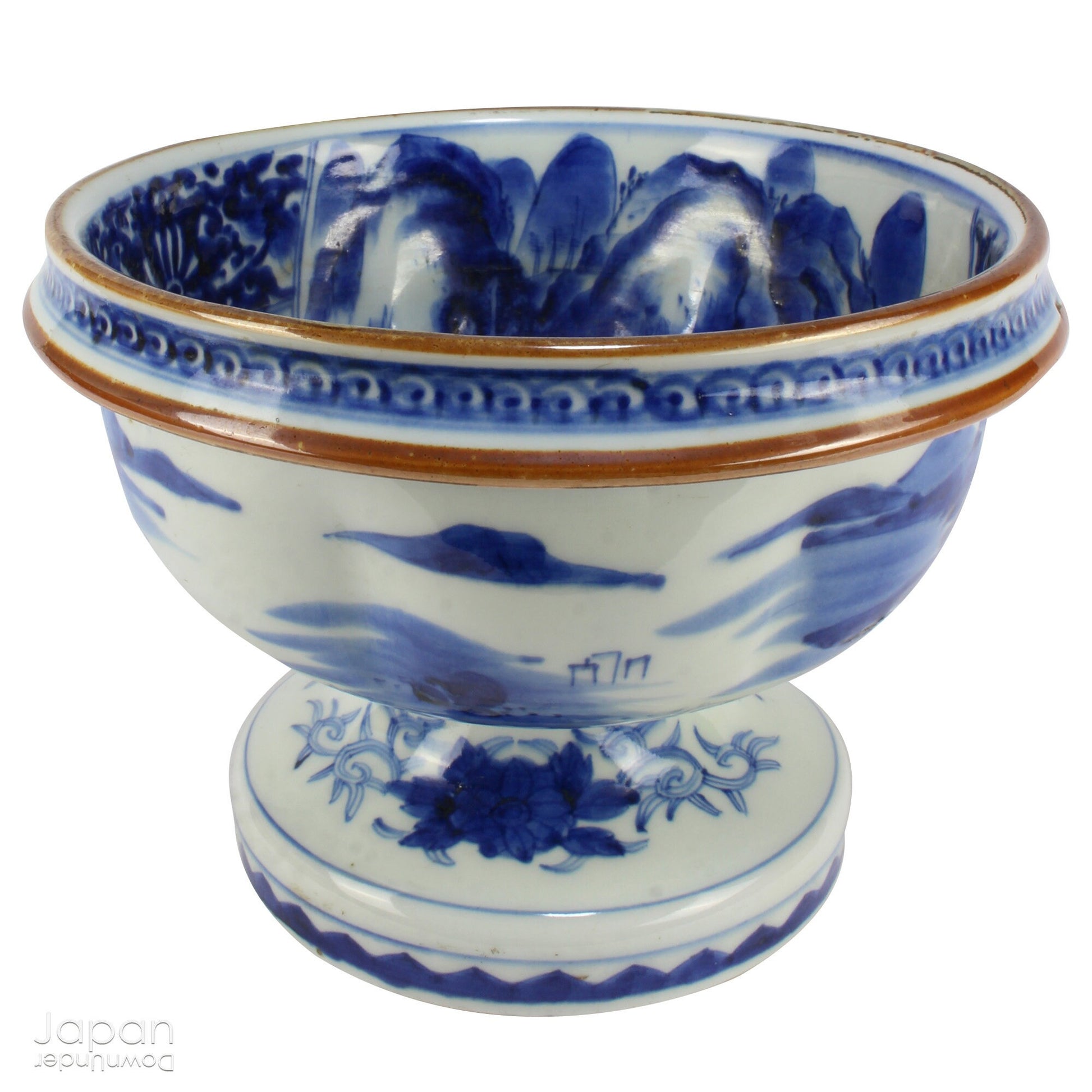 Elevate your home decor with this stunning antique blue and white Imari bowl on a stand. This rare and elegant piece features intricate hand-painted designs, both inside and out, showcasing craftsmanship that will captivate and enchant. Add a touch of sophistication and timeless beauty to any space with this exceptional treasure.