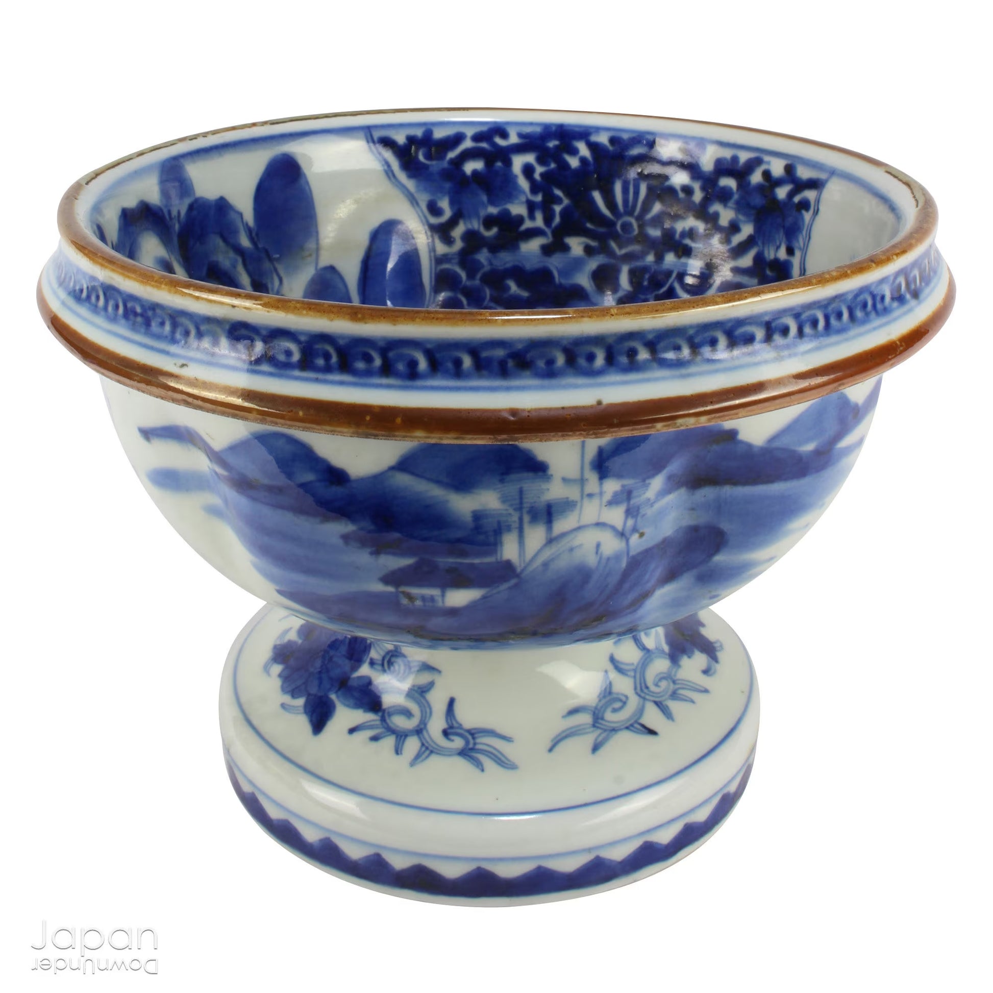 Elevate your home decor with this stunning antique blue and white Imari bowl on a stand. This rare and elegant piece features intricate hand-painted designs, both inside and out, showcasing craftsmanship that will captivate and enchant. Add a touch of sophistication and timeless beauty to any space with this exceptional treasure.
