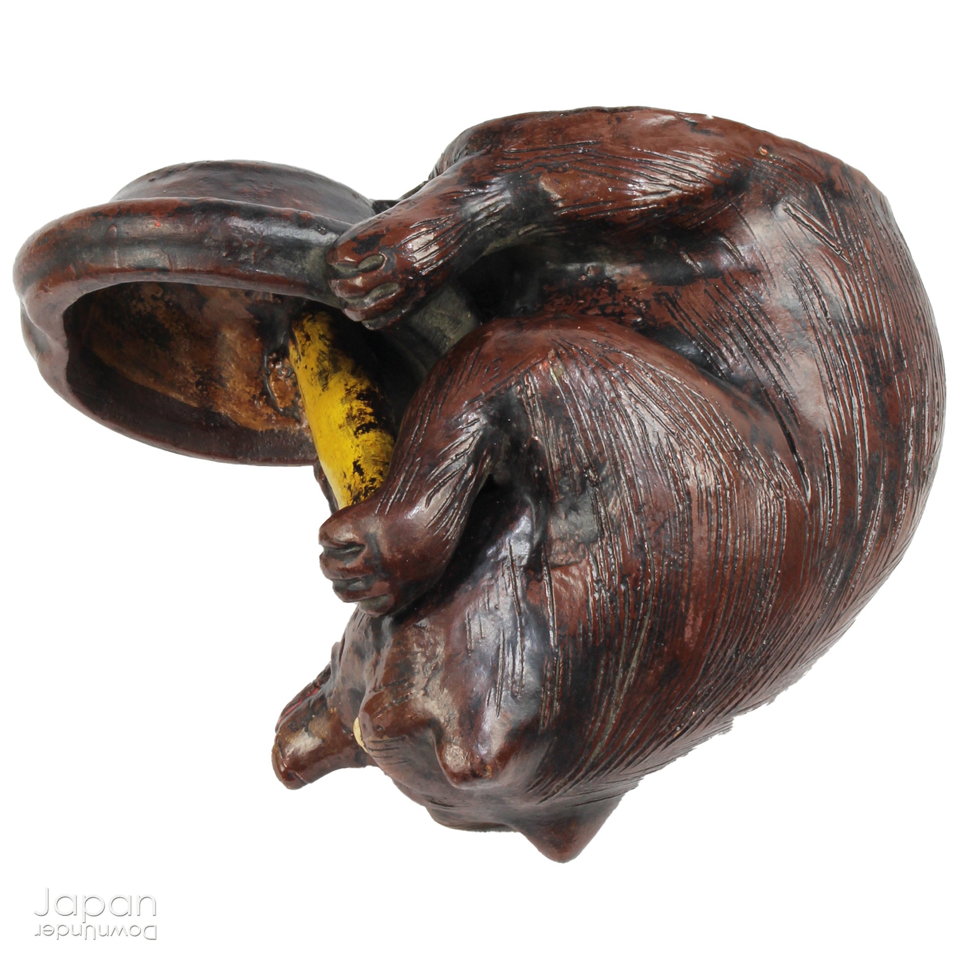 The tanuki has long been cherished in Japanese culture, evolving from a mischievous shapeshifter into a symbol of prosperity, good luck, and jovial mischief. Often associated with wealth and success in business, this playful figure is a familiar sight outside shops and homes - offering not just charm, but blessings too.