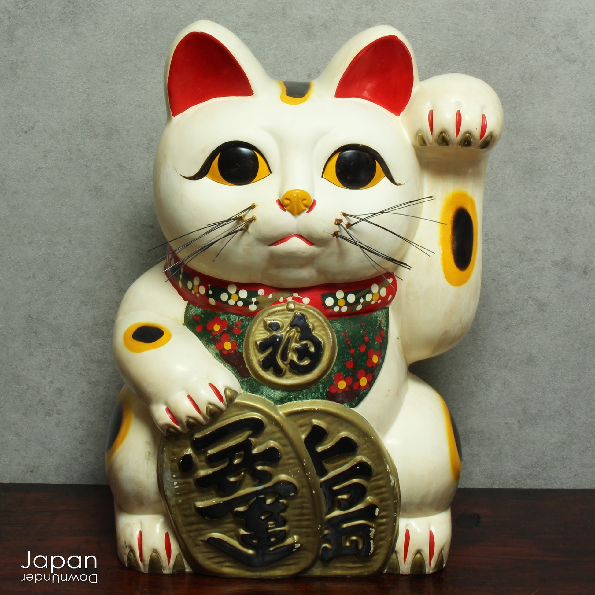 Invite good fortune and wealth into your home or business with this stunning, oversized white Maneki Neko, the iconic Japanese "lucky cat." With a rich history steeped in tradition, this unique piece isn’t just a collector’s item -it’s a symbol of prosperity, positive energy, and timeless charm.