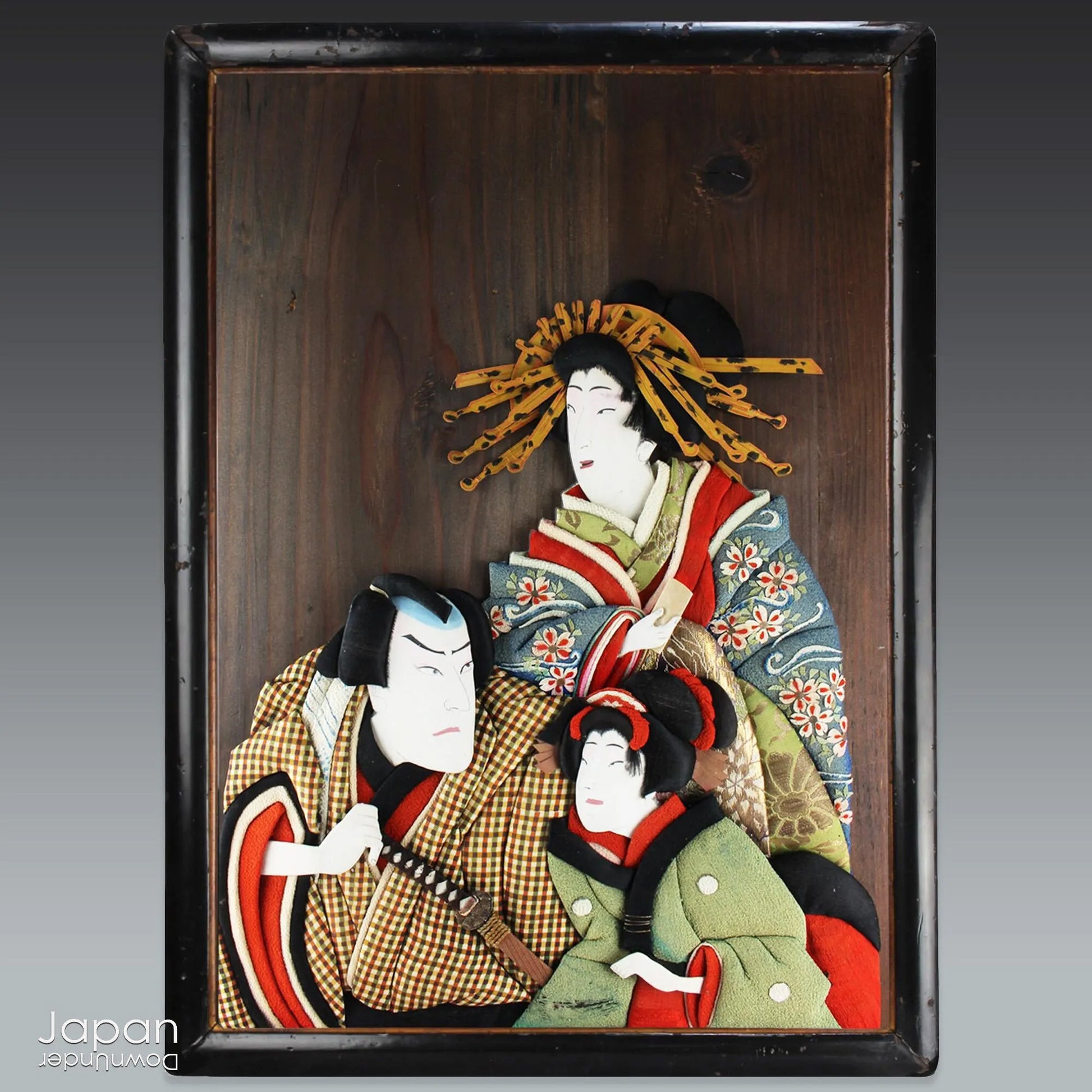 Infuse your home with the rich history and exquisite craftsmanship of this framed antique traditional Japanese Oshie fabric art. Featuring intricate, three-dimensional depictions of Kabuki players, this piece is a true masterpiece that will captivate and become a striking focal point in any room.