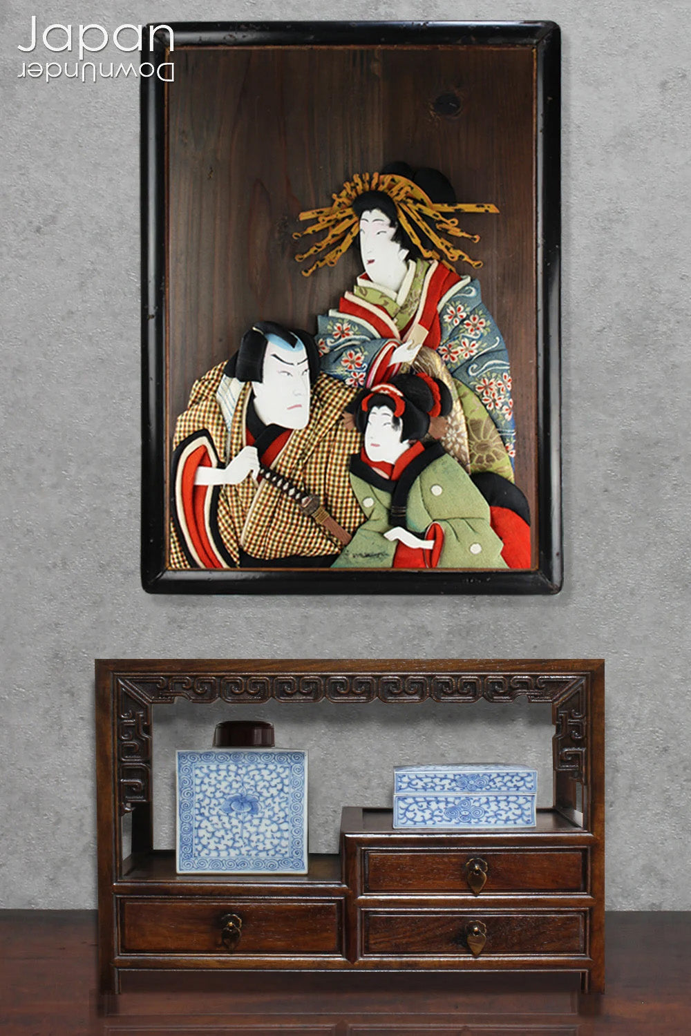 Infuse your home with the rich history and exquisite craftsmanship of this framed antique traditional Japanese Oshie fabric art. Featuring intricate, three-dimensional depictions of Kabuki players, this piece is a true masterpiece that will captivate and become a striking focal point in any room.