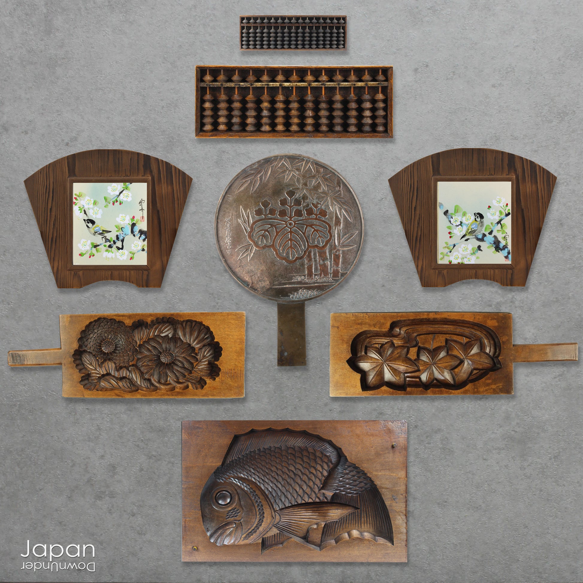 Step into the world of Japanese craftsmanship with this antique bronze mirror from the early 1900s. A captivating blend of history and artistry, it features intricate metalwork that elevates it from a mere functional piece to a cherished treasure.