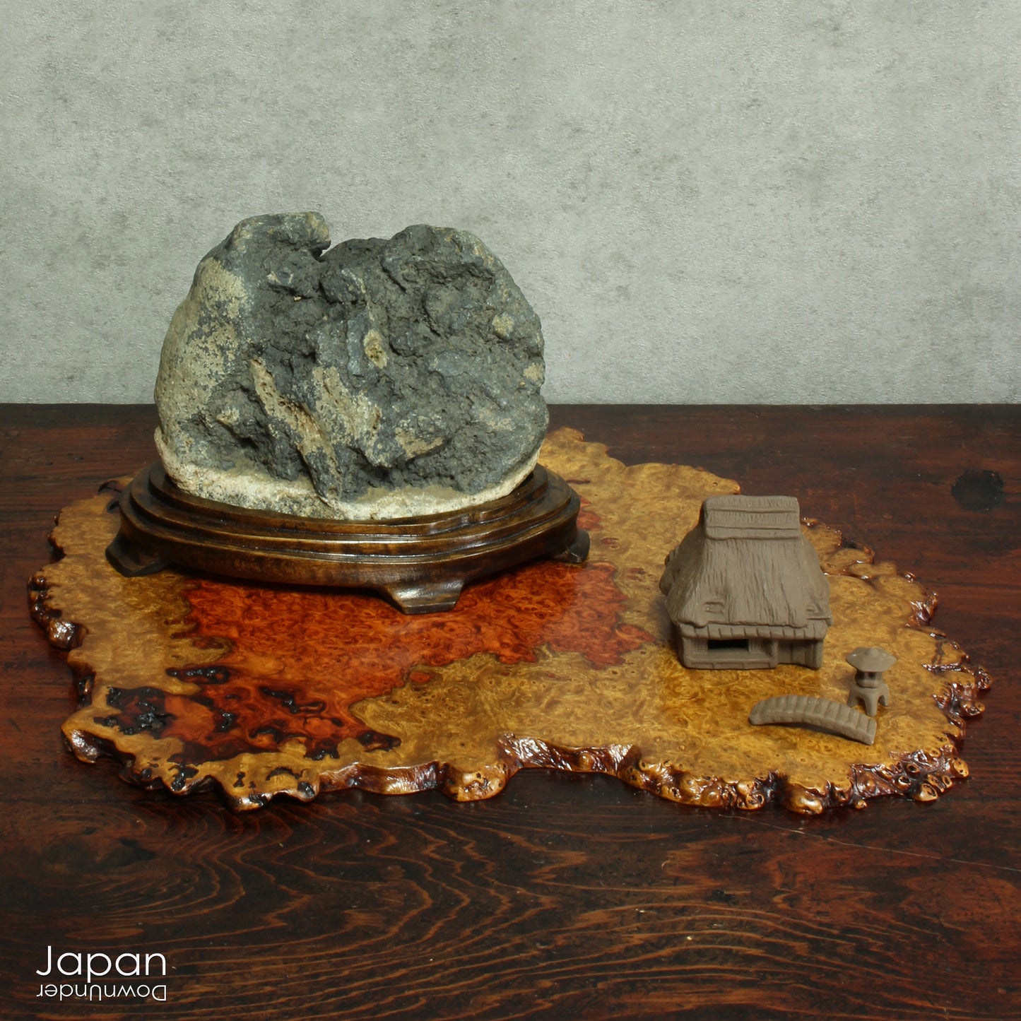 Bring timeless elegance and natural beauty into your space with this exquisite stand, handcrafted from rare burled Chinese quince wood. Designed to showcase bonsai, suiseki viewing stones, treasured ornaments, or seasonal flower arrangements, this piece adds a refined touch to any setting.