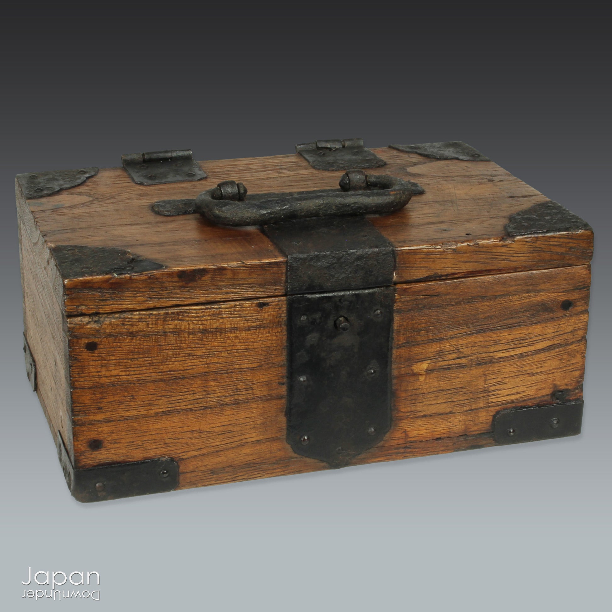 Discover the understated beauty of this Meiji era, small Japanese wooden box, a piece that effortlessly blends rustic simplicity with practical elegance. Perfect for storing your cherished small items, it adds a subtle touch of folk art to any space while offering a unique, storied storage solution.