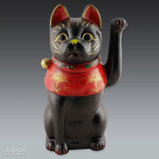 Let a little luck and charm stroll into your space with this delightful black maneki neko (beckoning cat), lovingly handcrafted in the traditional kilns of Seto, Aichi Prefecture. Known as one of Japan’s revered “Six Ancient Kilns,” Seto has a centuries-old reputation for crafting these iconic feline figures - symbols of good fortune, protection, and prosperity.