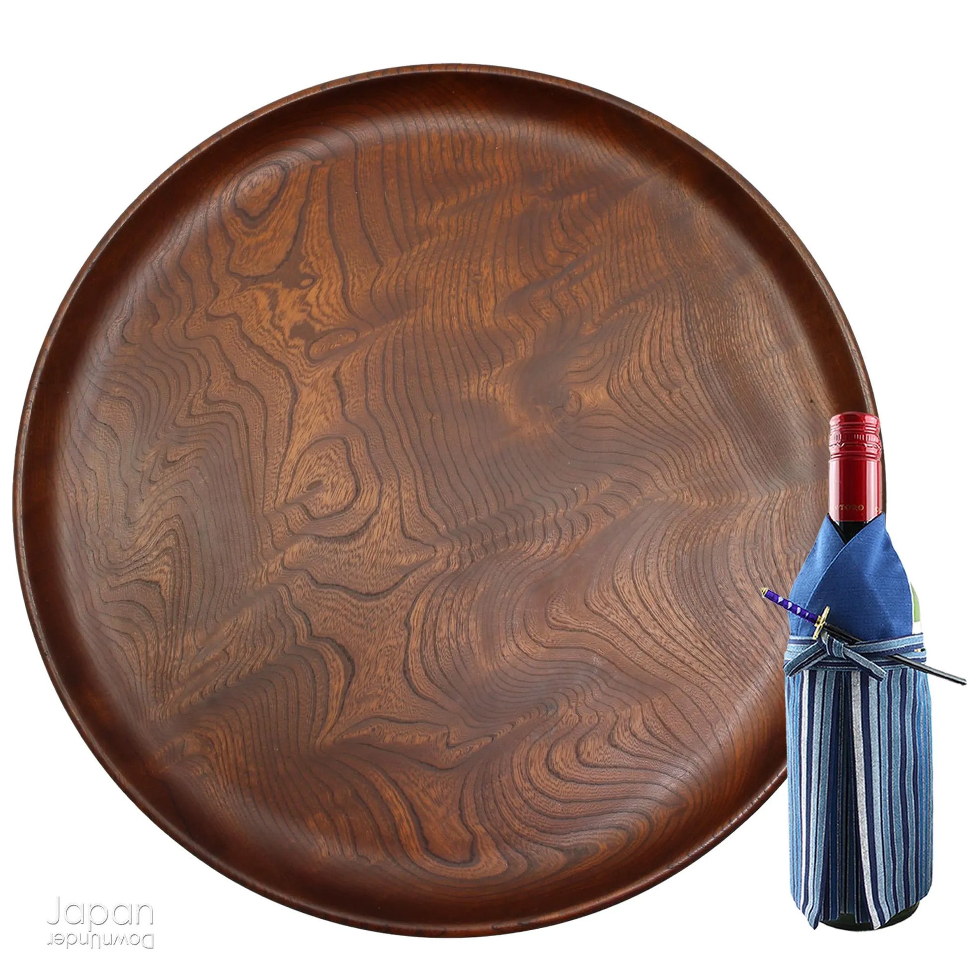 Bring timeless beauty and refined craftsmanship into your home with this very large antique tea tray - a striking piece perfect for tea ceremonies or as a unique decorative accent. Hand-carved from a single cross-section of high-quality zelkova (keyaki) wood, this tray seamlessly blends function and artistry, making it a standout addition to any setting.
