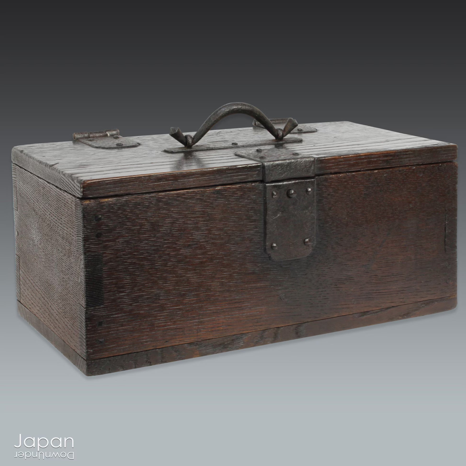 Uncover the quiet charm of this small wooden box from Japan’s Meiji period - a timeless piece where rustic practicality meets understated beauty. Modest in size but rich in character, this box offers a refined way to store your cherished small items while adding a touch of historical elegance to any space.