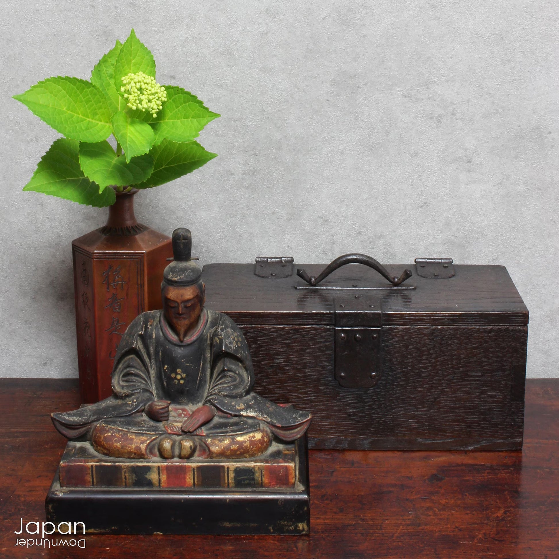Uncover the quiet charm of this small wooden box from Japan’s Meiji period - a timeless piece where rustic practicality meets understated beauty. Modest in size but rich in character, this box offers a refined way to store your cherished small items while adding a touch of historical elegance to any space.