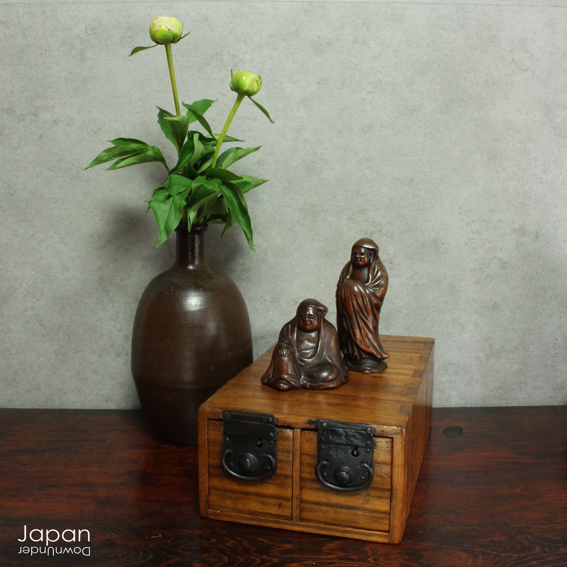 Add a touch of history and heritage to your desk with this antique Japanese medicine chest -  a beautifully rustic piece that blends traditional folk art with everyday functionality. Once used in a centuries-old system of home-based healthcare, this small storage box now offers a unique and charming way to organize your workspace.