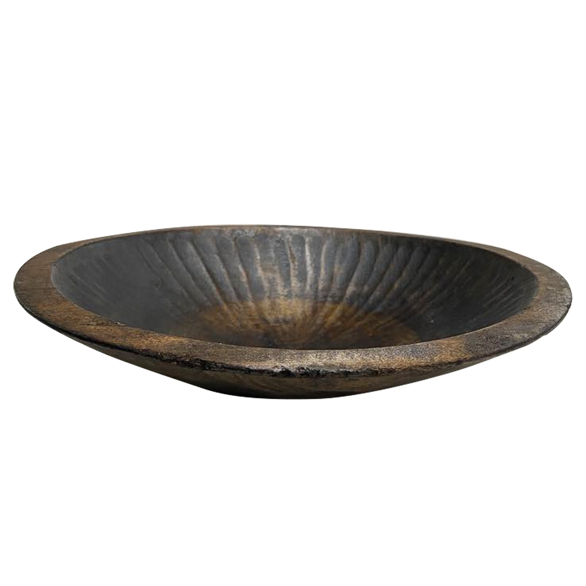 Discover a truly unique artifact of Japanese folk craftsmanship - a rare, hand-carved hinoki wood tray from the 1800s, once used in the traditional silk industry. This shallow wooden vessel, carved from a single piece of tree trunk, was originally designed to collect silkworm cocoons - a daily tool in the lives of sericulture farmers during Japan’s Meiji Era (1868–1912).
