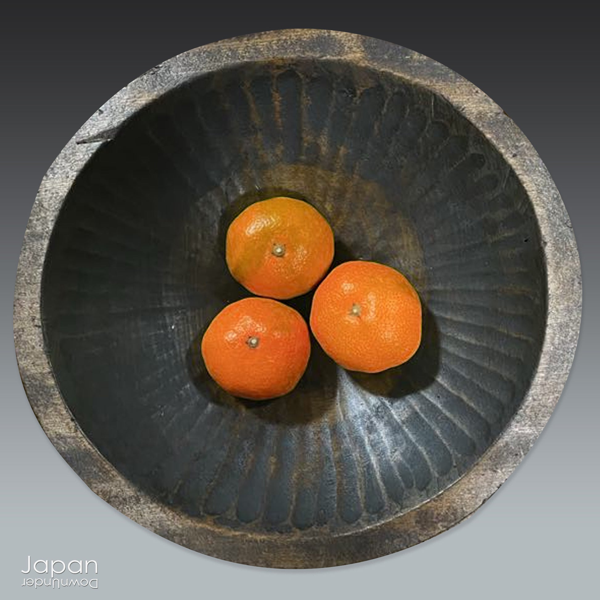 Discover a truly unique artifact of Japanese folk craftsmanship - a rare, hand-carved hinoki wood tray from the 1800s, once used in the traditional silk industry. This shallow wooden vessel, carved from a single piece of tree trunk, was originally designed to collect silkworm cocoons - a daily tool in the lives of sericulture farmers during Japan’s Meiji Era (1868–1912).