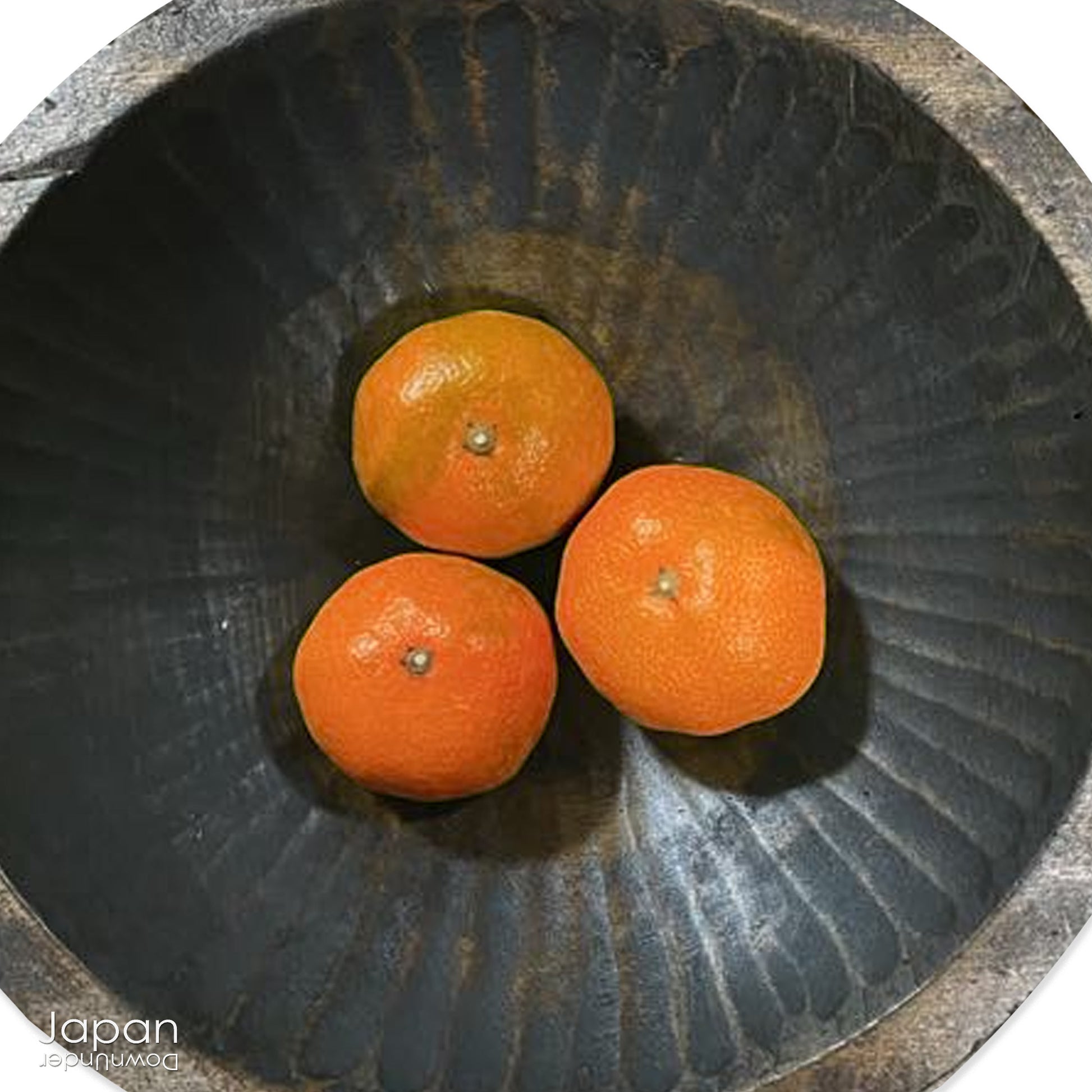 Discover a truly unique artifact of Japanese folk craftsmanship - a rare, hand-carved hinoki wood tray from the 1800s, once used in the traditional silk industry. This shallow wooden vessel, carved from a single piece of tree trunk, was originally designed to collect silkworm cocoons - a daily tool in the lives of sericulture farmers during Japan’s Meiji Era (1868–1912).