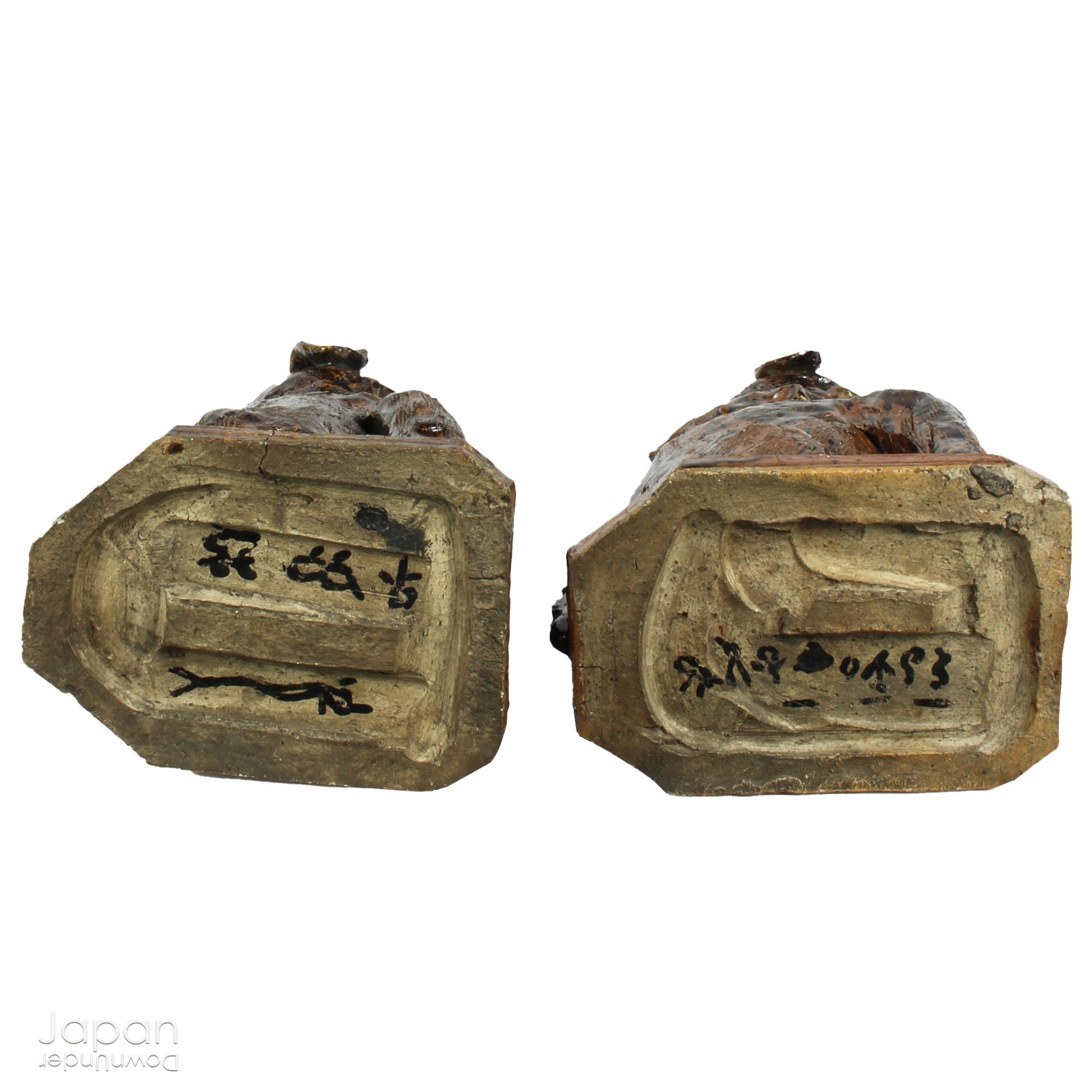 An enchanting duo of antique stoneware lion dogs, known as komainu. Believed to ward off evil, these guardians stand watch at the entrance of Shinto shrines, and will add a touch of mystique to your decor. Handcrafted with intricate details, the lion dogs are sure to bring a sense of protection and tradition to your space.