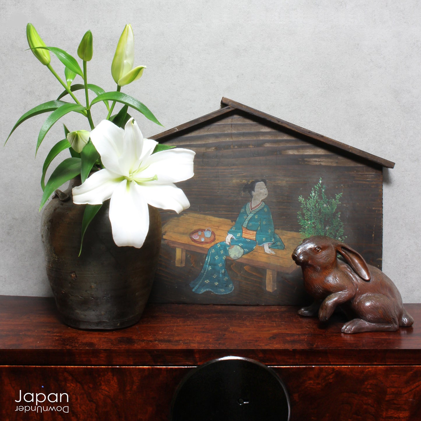 Step back in time with this wonderful Meiji era Bizen rabbit sculpture, a rare treasure that brings the essence of Japanese artistry into your home. This beautifully minimalist figure radiates rustic charm, effortlessly enhancing any room with its unique character and craftsmanship. Perfect for art collectors, enthusiasts, or anyone who appreciates the beauty of history captured in ceramic form.