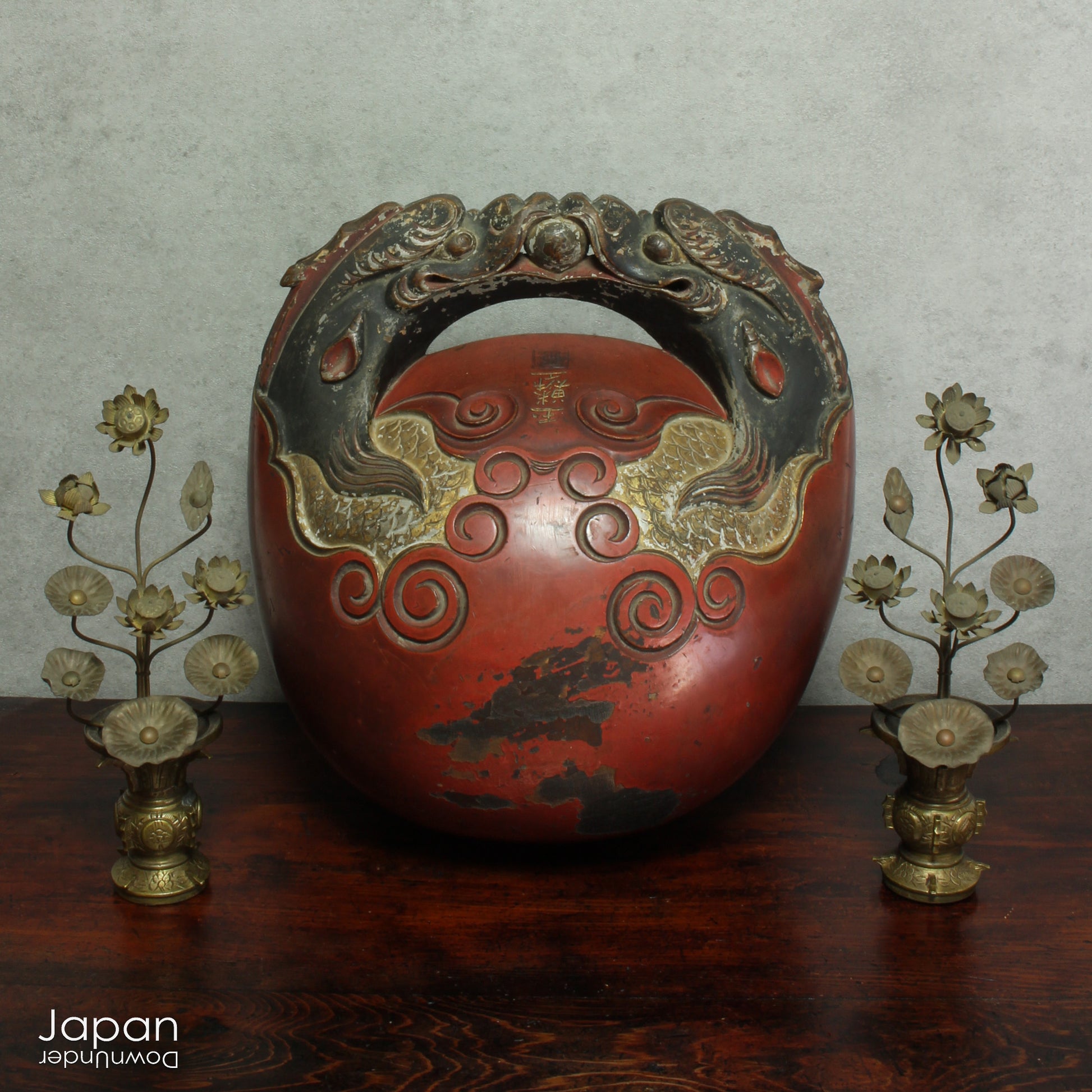 Infuse your home with serenity and grace with this exquisite pair of antique Buddhist lotus flower altar arrangements. These meticulously crafted metal flowers, known as Jouka, meaning "eternal flowers,” are a stunning representation of spiritual beauty. Set in decorative vases, these unique pieces offer a tranquil energy that will elevate any room.