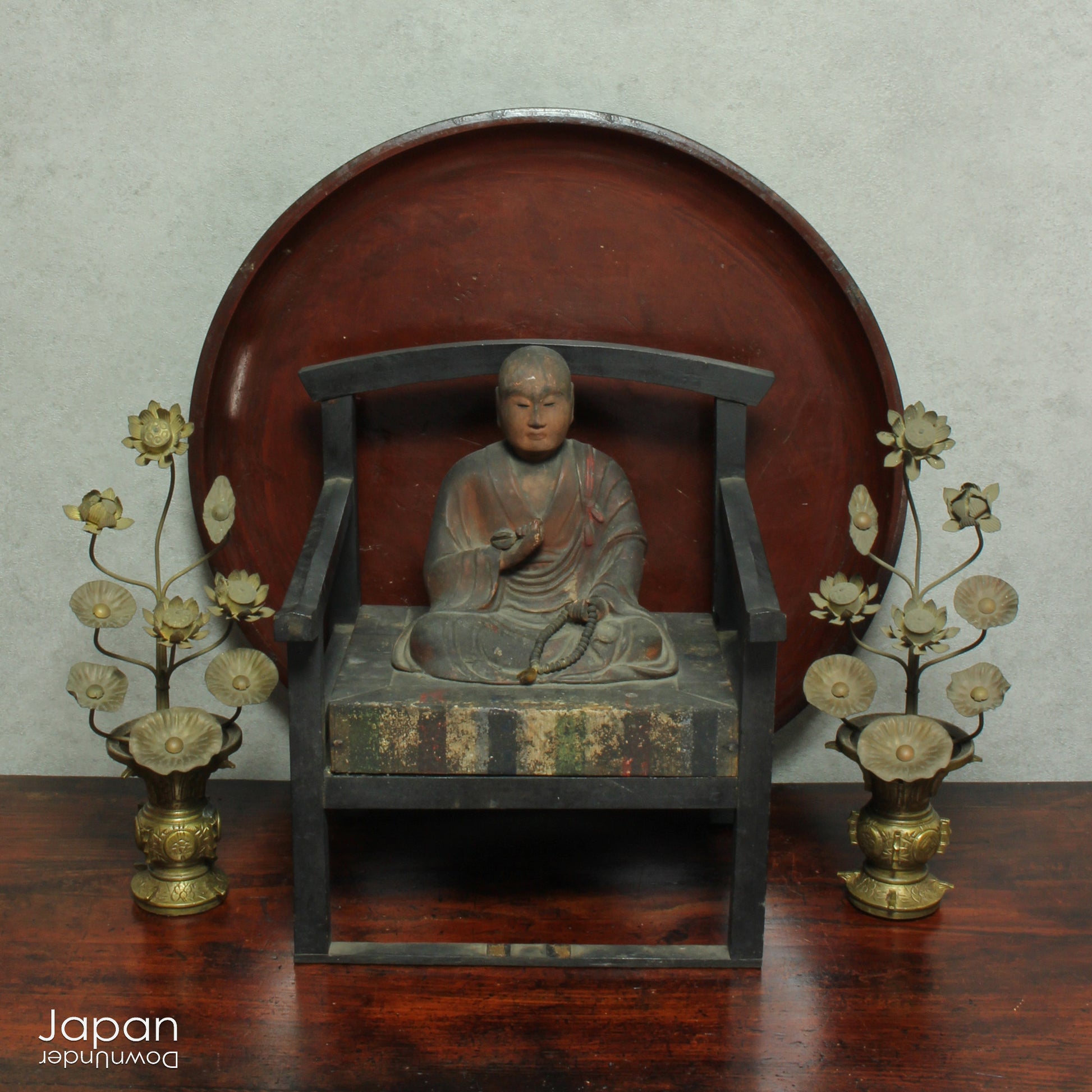 Infuse your home with serenity and grace with this exquisite pair of antique Buddhist lotus flower altar arrangements. These meticulously crafted metal flowers, known as Jouka, meaning "eternal flowers,” are a stunning representation of spiritual beauty. Set in decorative vases, these unique pieces offer a tranquil energy that will elevate any room.