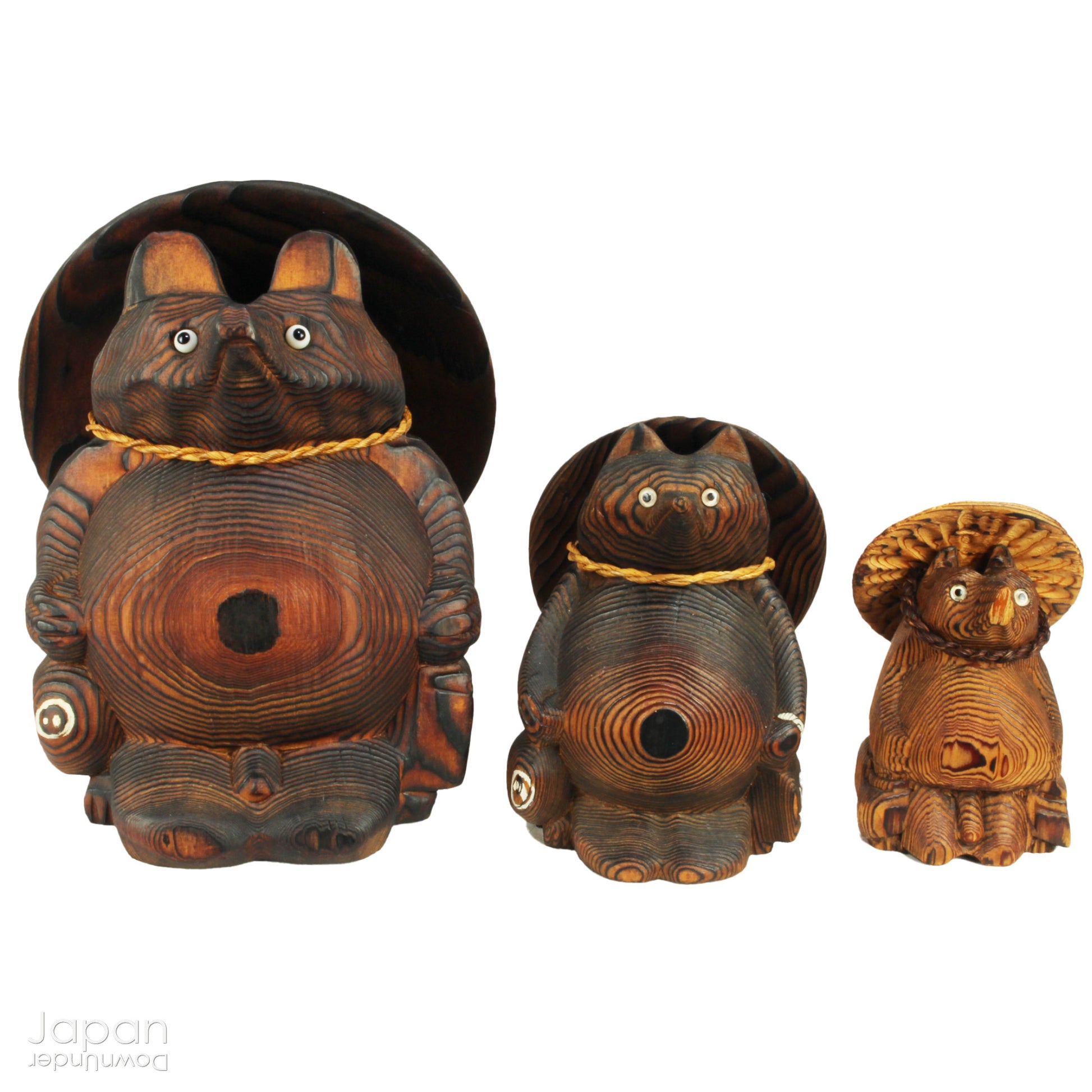Add a dash of charm and cultural richness to your home with this delightful set of three antique Japanese tanuki wood carvings - authentic examples of traditional Japanese folk art, long believed to be bringers of good luck and prosperity.