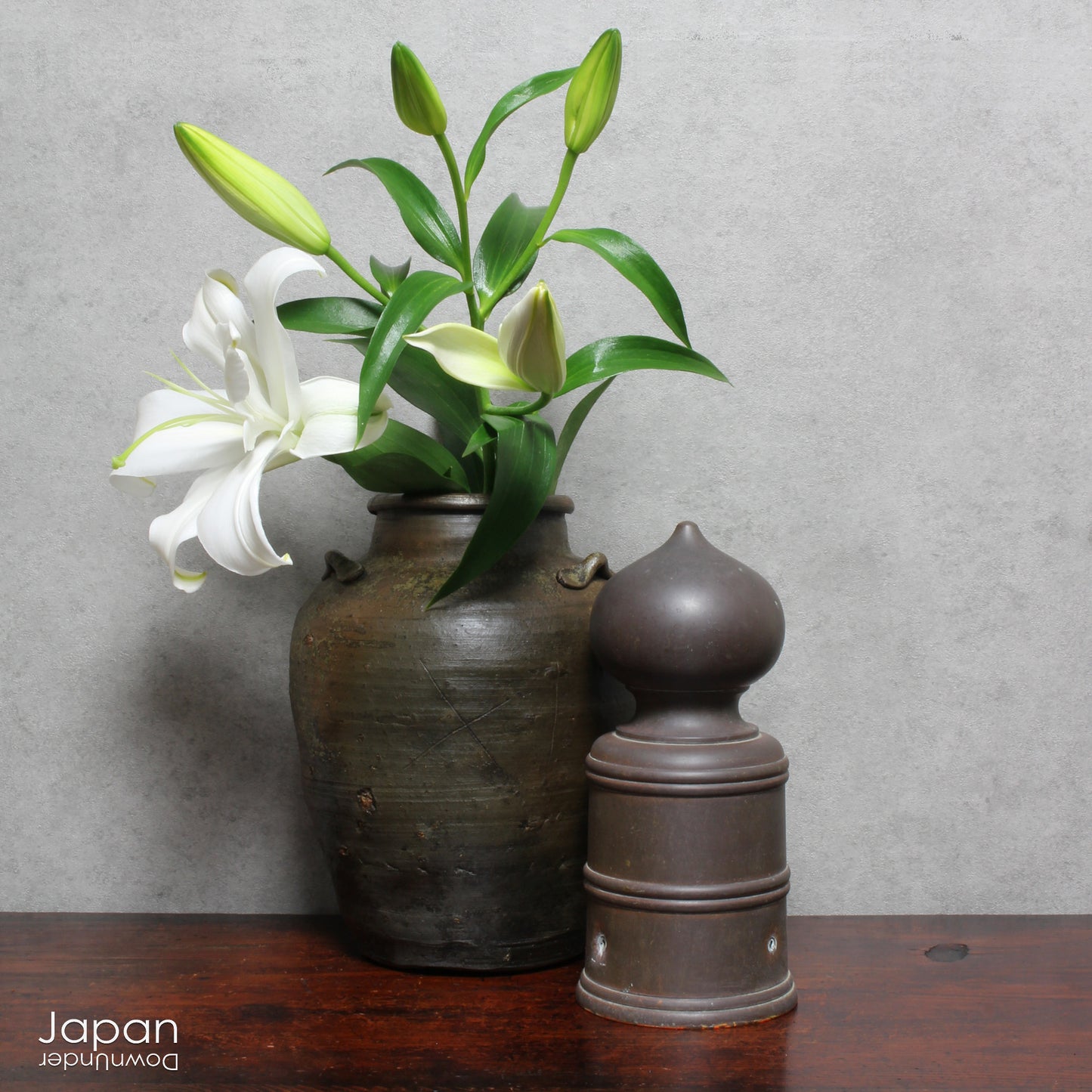 This handcrafted antique Bizen vase brings a serene, soulful presence to any interior. With its earthy tones and rustic textures, it offers more than simple decoration - it tells a story woven through centuries of Japanese heritage.