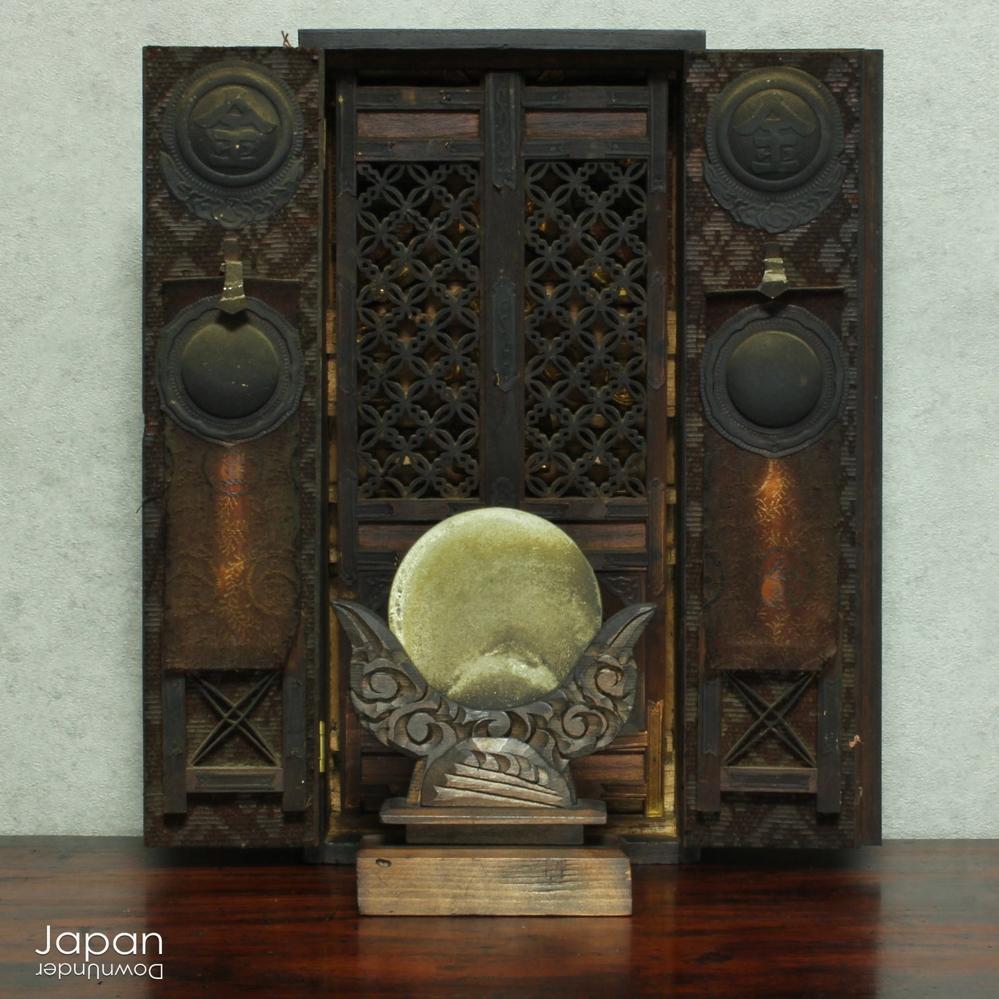 Bring a sense of spiritual heritage and timeless beauty into your space with this rare Meiji era antique Japanese Kamidana Shinto shrine, a scaled-down replica of the revered Konpira Shrine. Steeped in tradition and believed to offer prosperity in business and protection to sea travelers, fishermen, and sailors, this piece carries deep cultural and spiritual significance - a truly unique addition to any home or collection.